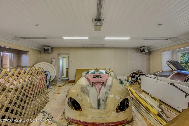 a kitchen with lots of appliances and cabinets