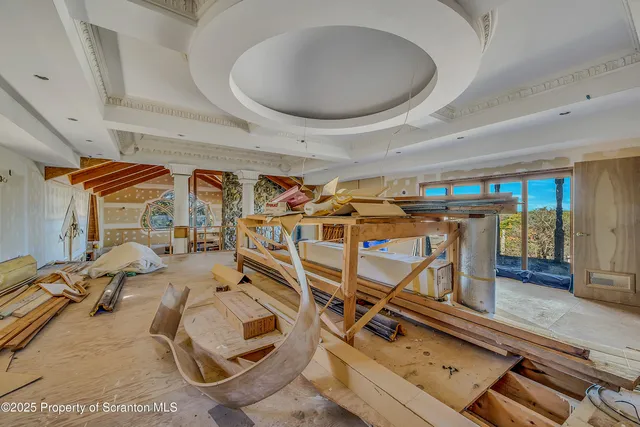 a bathroom with a tub and shower