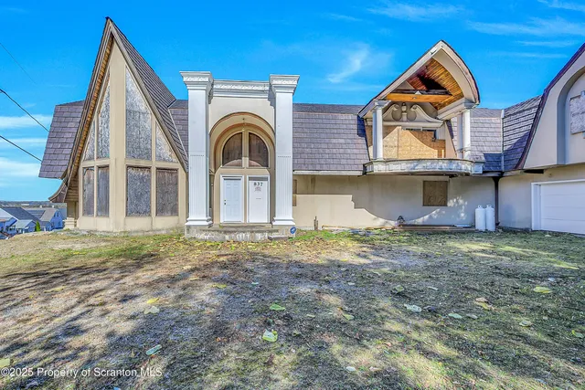 a view of an entryway with staircase
