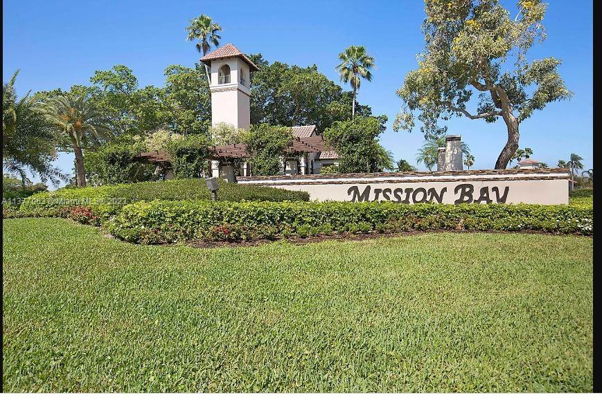 10739 Santa Rosa Drive Boca Raton, FL 33498 - Photo 54 of 73 a view of a sign in front of a house