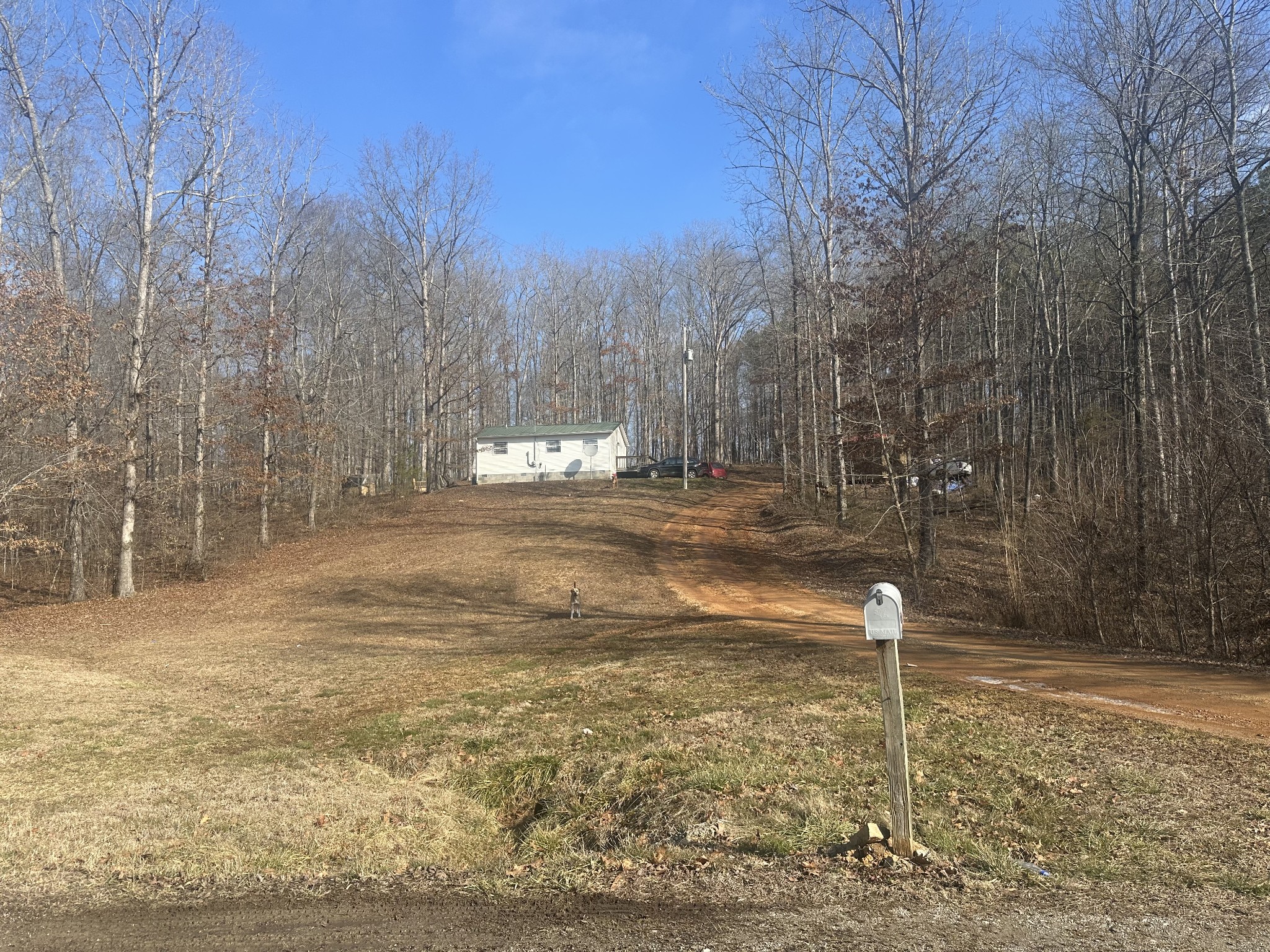 104 Clifton Road Lawrenceburg, TN 38464 - Photo 1 of 14 a backyard of a house with lots of green space