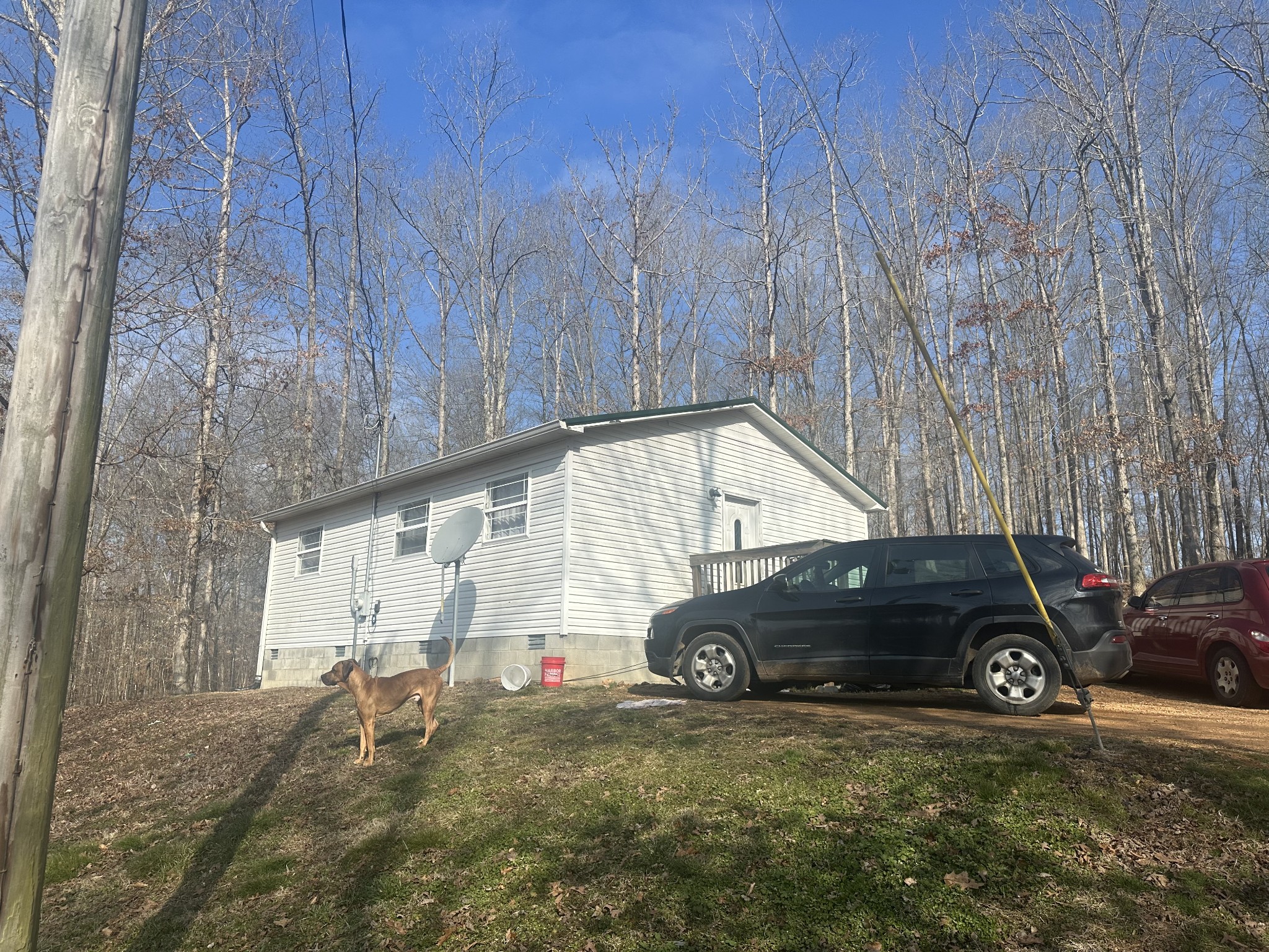104 Clifton Road Lawrenceburg, TN 38464 - Photo 3 of 14 a view of a car parked front of a house