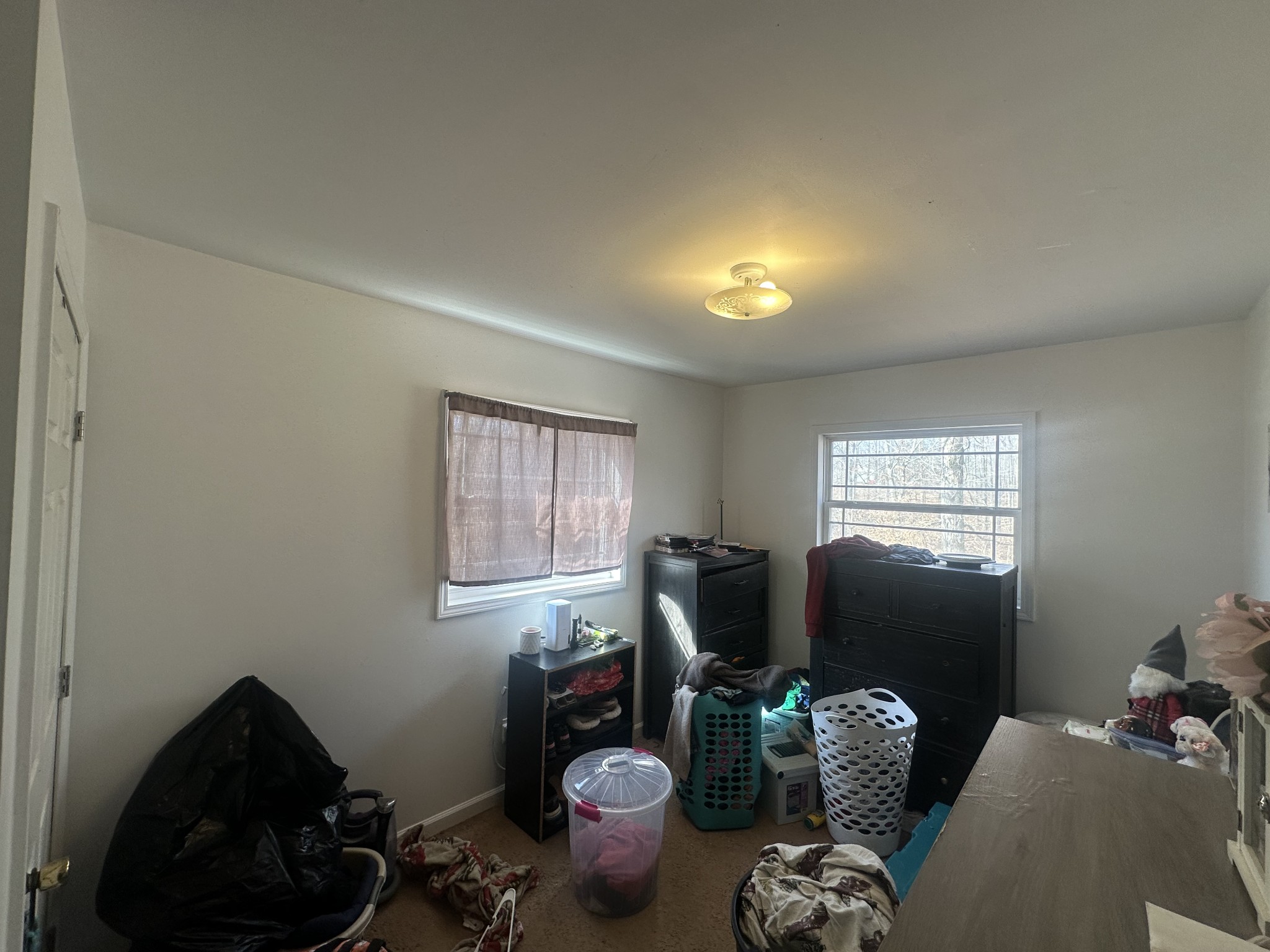 104 Clifton Road Lawrenceburg, TN 38464 - Photo 8 of 14 a room with furniture and window