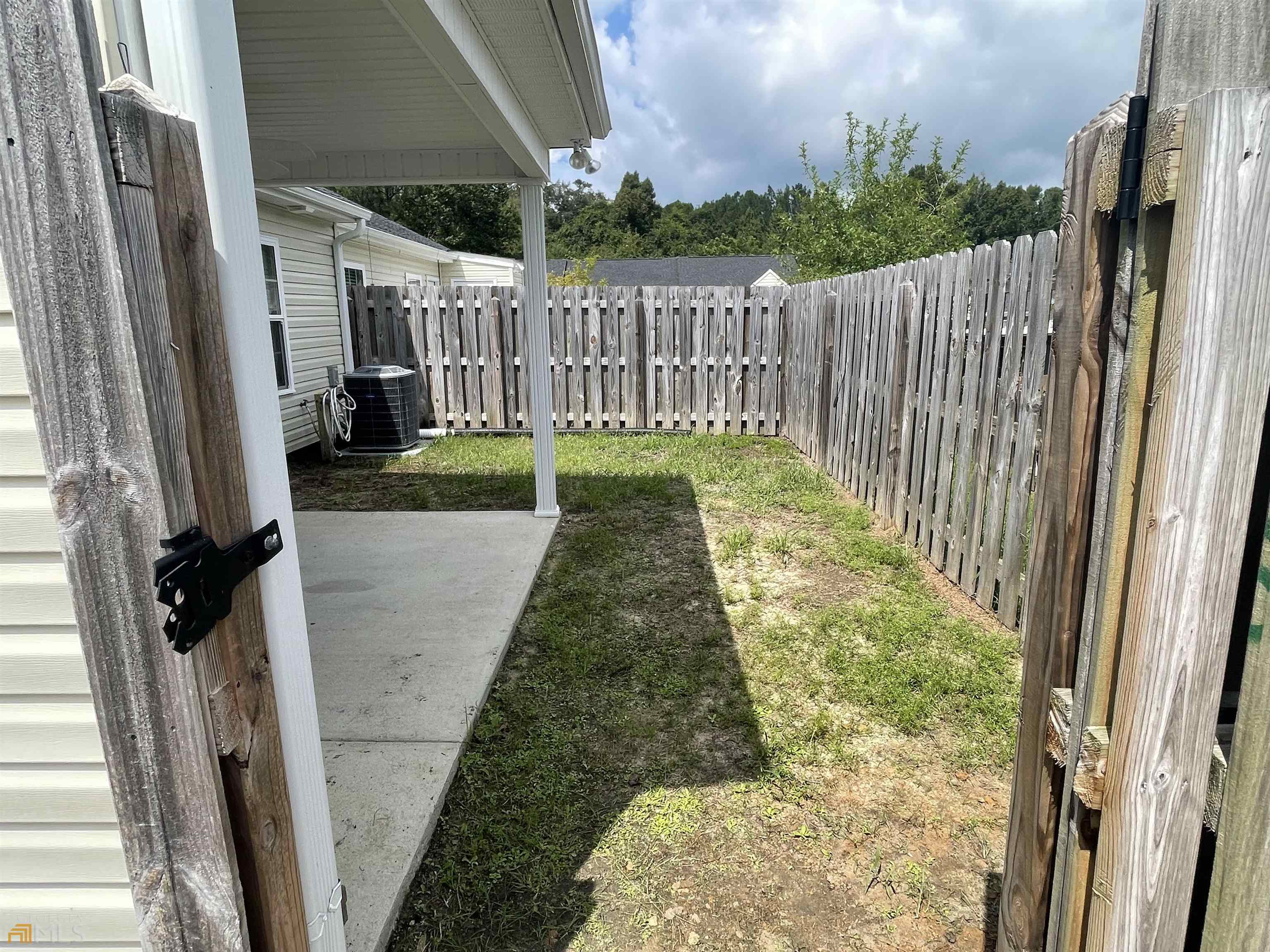 148 Buckhaven Way, Unit 148 Statesboro, GA 30458 - Photo 7 of 27 a view of a garden