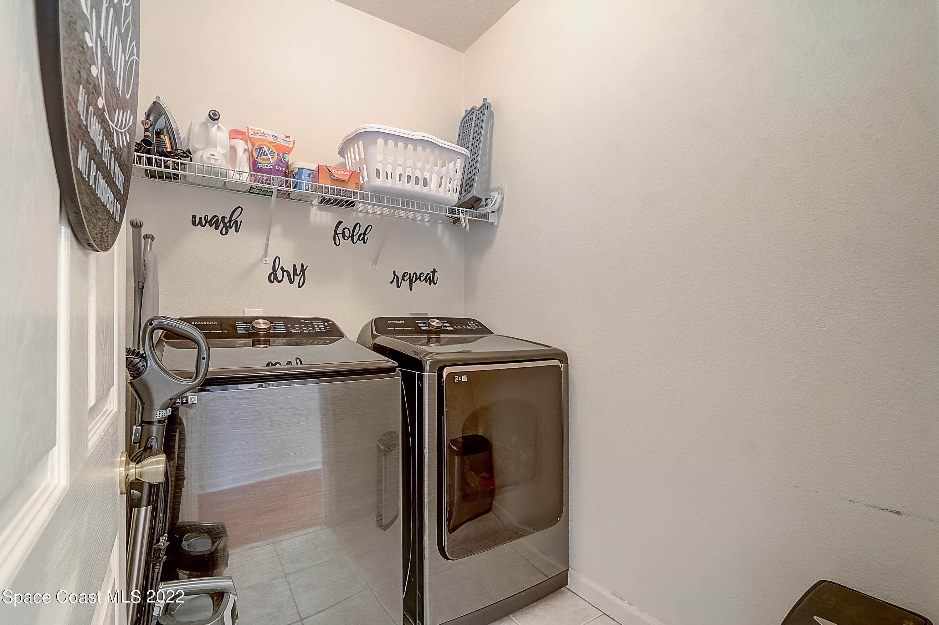 3687 Mt Carmel Lane Melbourne, FL 32901 - Photo 18 of 46 a close view of a storage and utility room with a sink