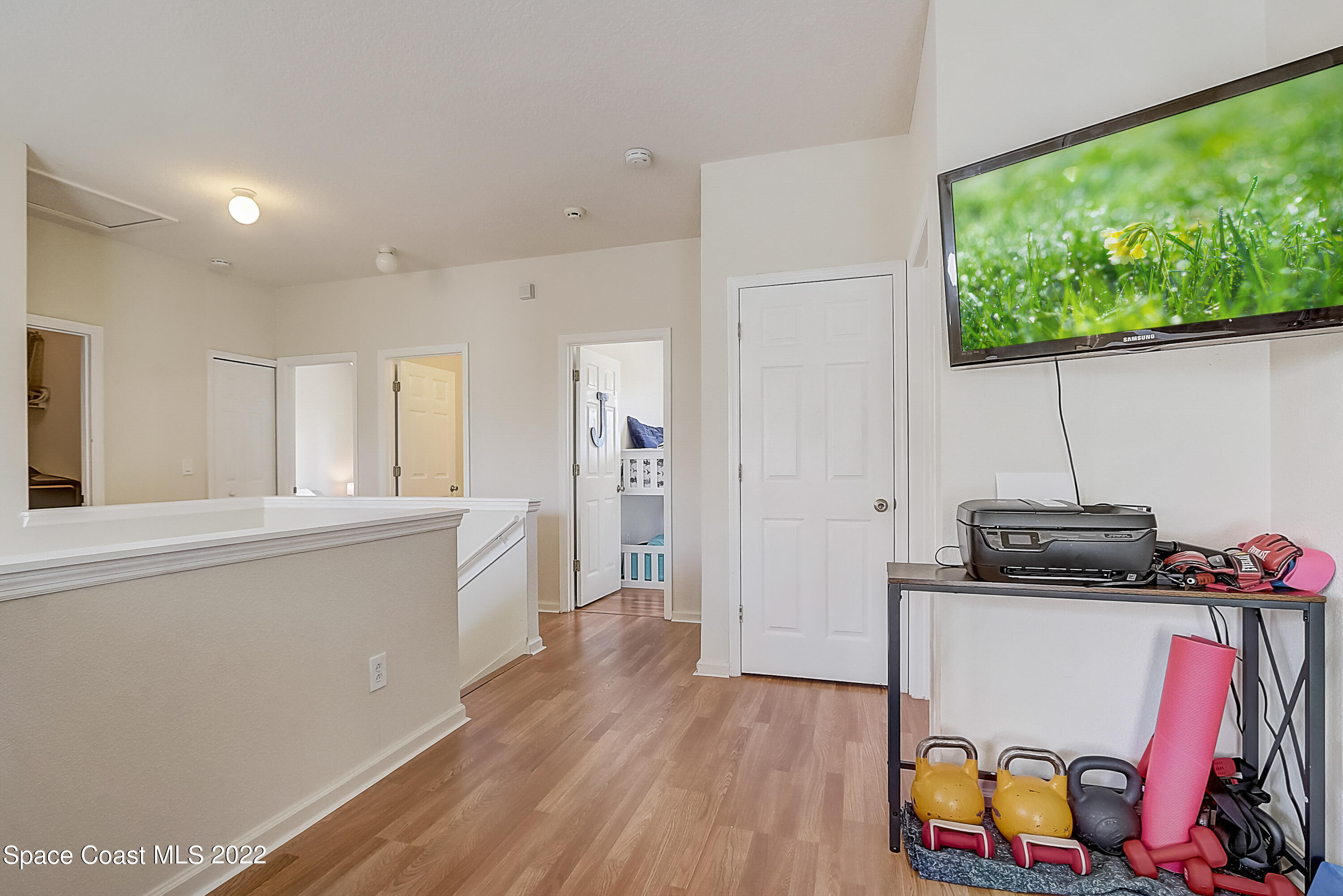 3687 Mt Carmel Lane Melbourne, FL 32901 - Photo 33 of 46 a kitchen with a refrigerator and a stove top oven