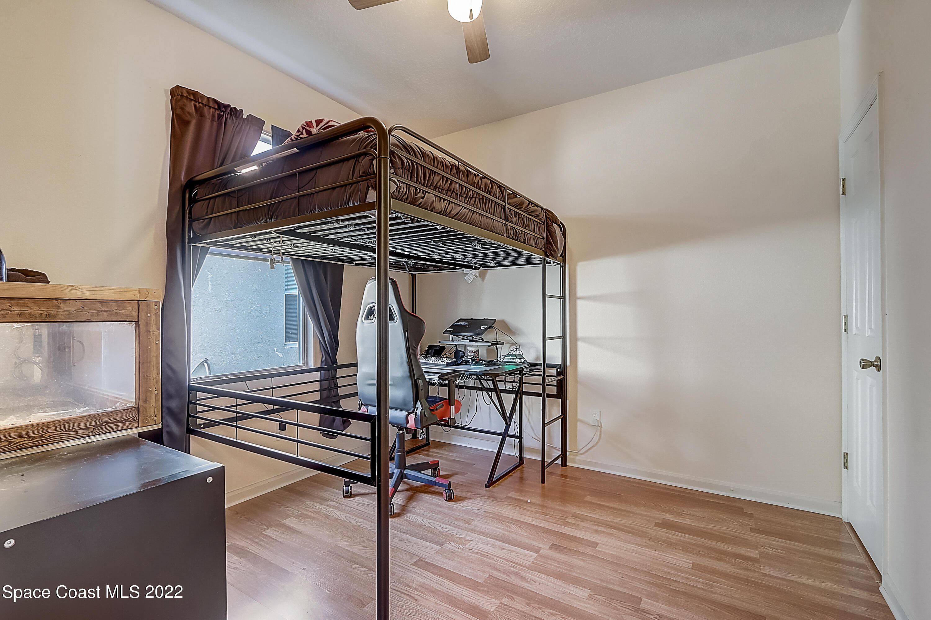 3687 Mt Carmel Lane Melbourne, FL 32901 - Photo 34 of 46 a view of livingroom with furniture and hardwood floor