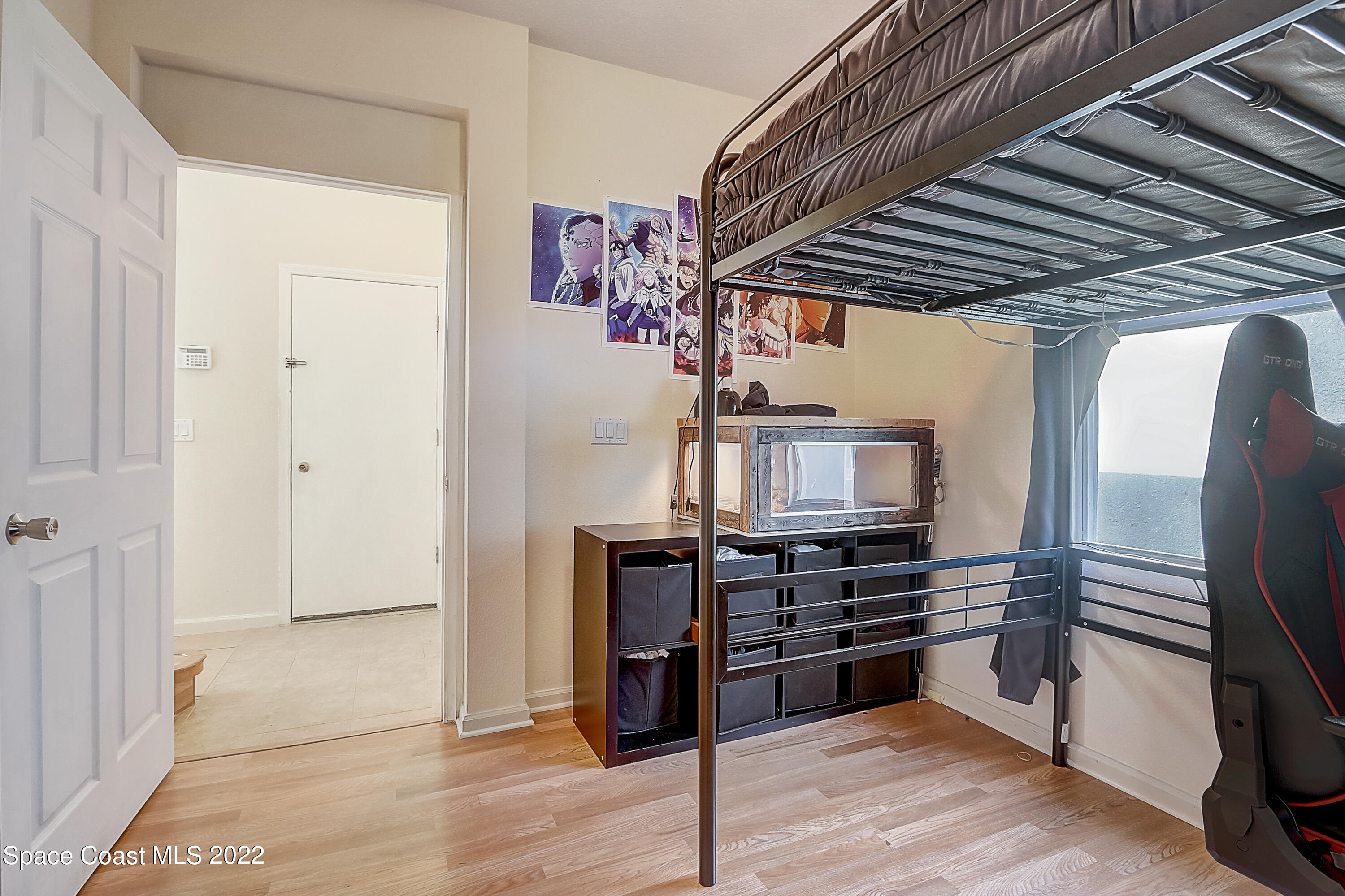 3687 Mt Carmel Lane Melbourne, FL 32901 - Photo 35 of 46 a view of kitchen with furniture and wooden floor