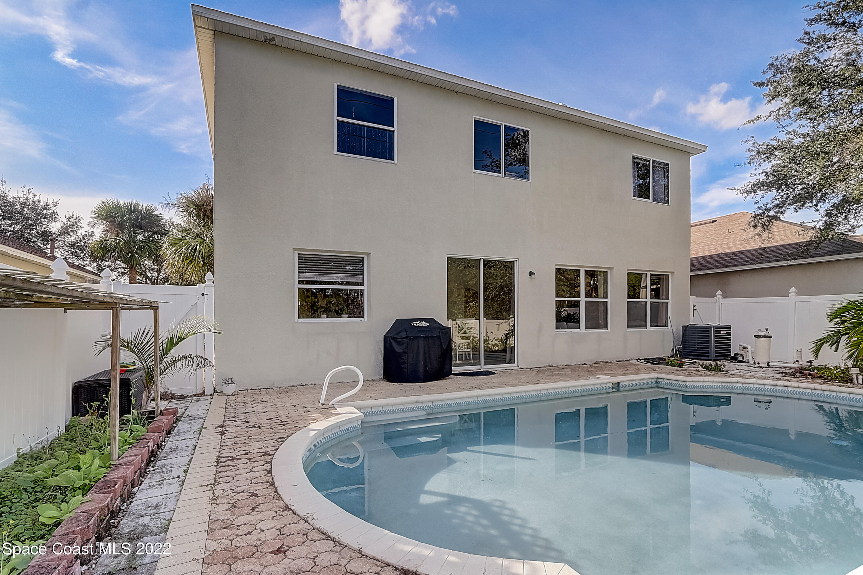3687 Mt Carmel Lane Melbourne, FL 32901 - Photo 39 of 46 a view of a house with backyard