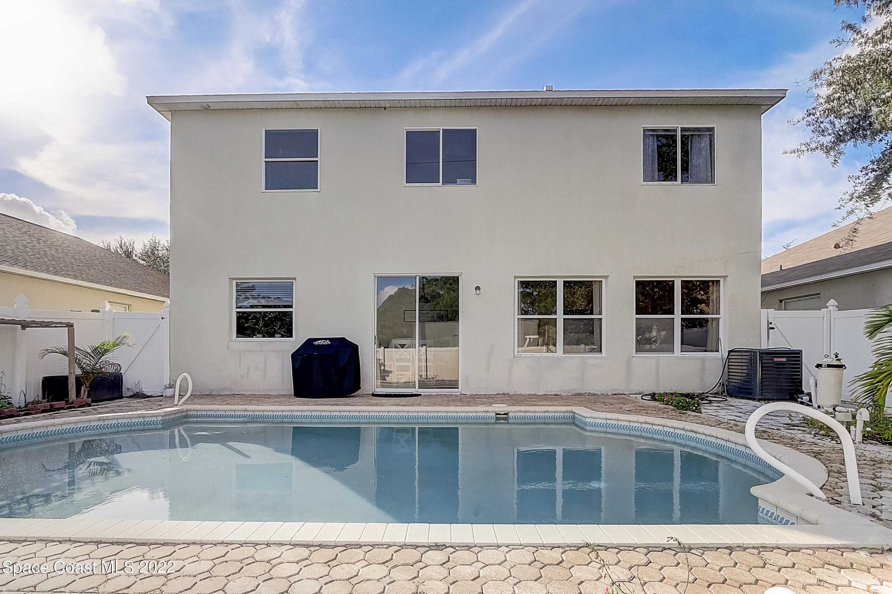 3687 Mt Carmel Lane Melbourne, FL 32901 - Photo 41 of 46 a view of a kitchen with a large counter top