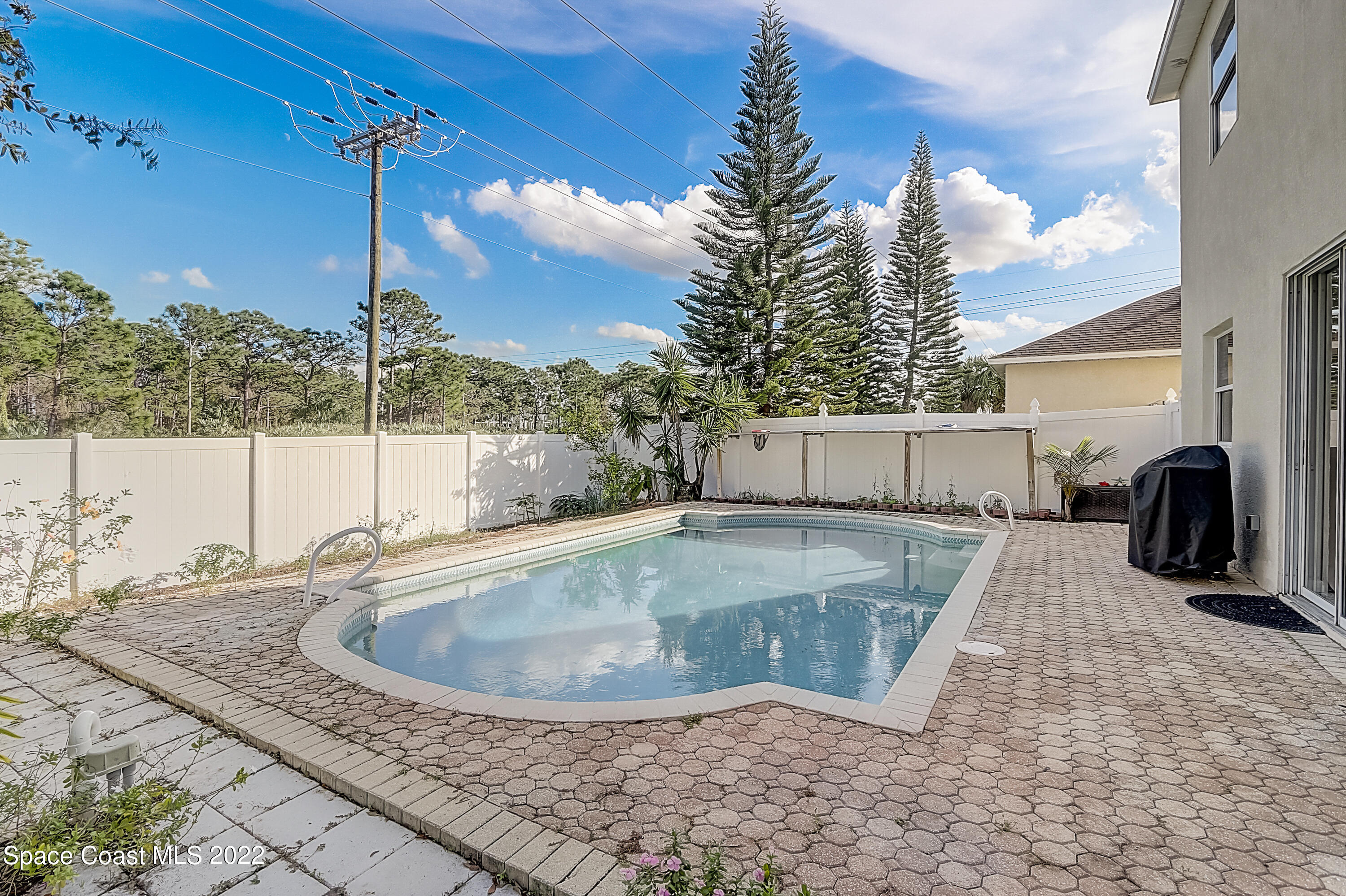 3687 Mt Carmel Lane Melbourne, FL 32901 - Photo 43 of 46 a view of a backyard