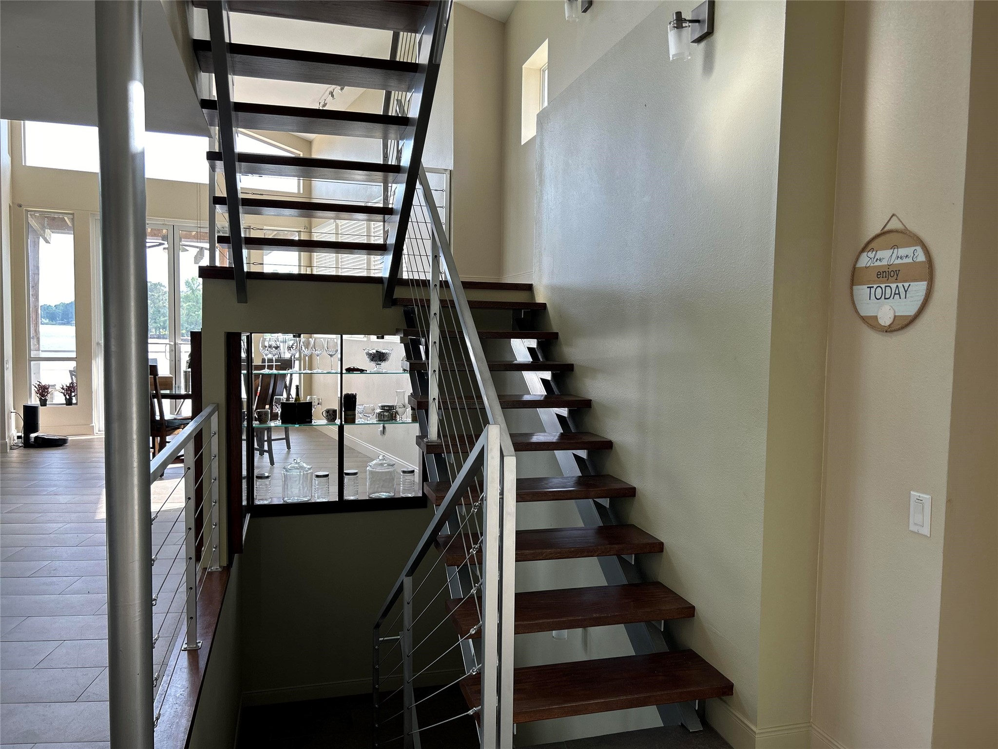 68 Edgewater Way Point Blank, TX 77364 - Photo 19 of 49 STAIRS ON SECOND FLOOR LEADING TO THIRD AND BASEMENT FLOORS