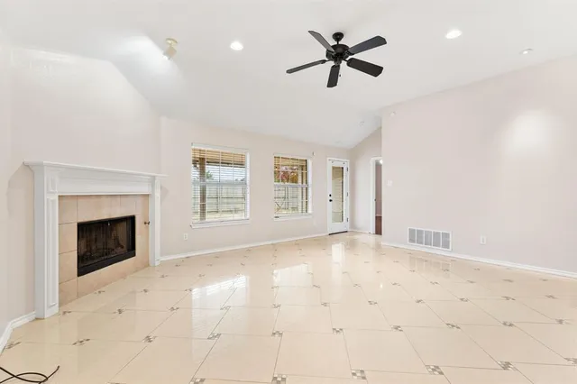 a view of a kitchen with furniture and a fireplace