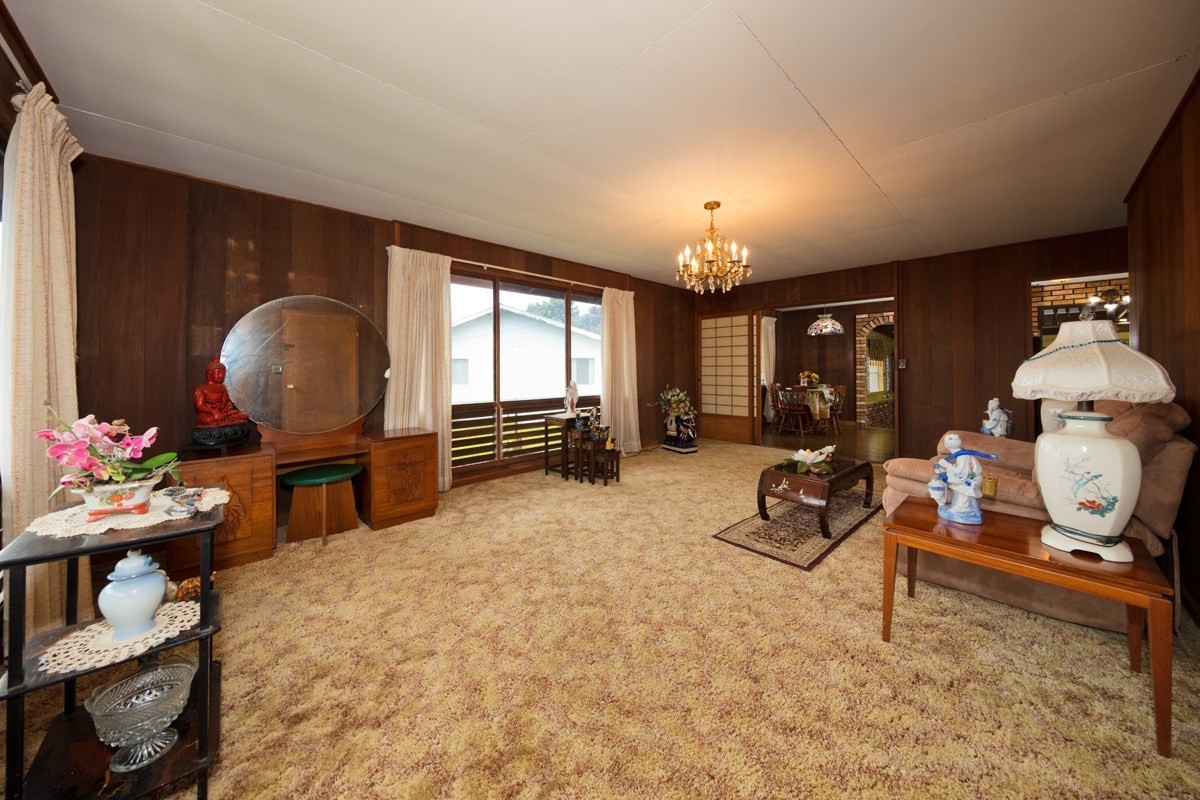 25 Kaapuni Loop Hilo, HI 96720 - Photo 13 of 25 a living room with furniture a rug and gym equipment