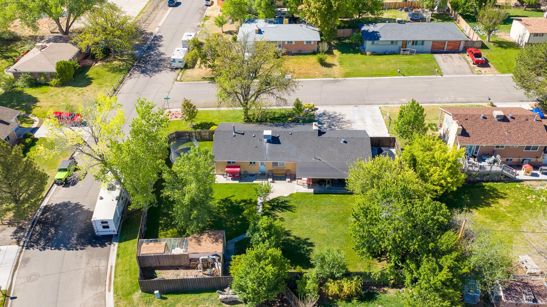 2118 Saguaro Road Grand Junction, CO 81507 - Photo 38 of 42 an aerial view of a house with a yard and lake view