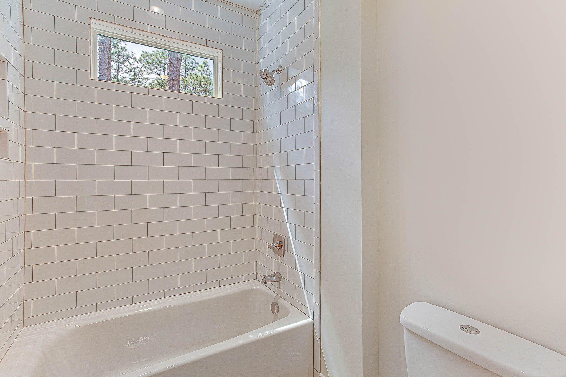 126 Turner Road Pinehurst, NC 28374 - Photo 44 of 56 Turner Guest full bathroom tub with tile
