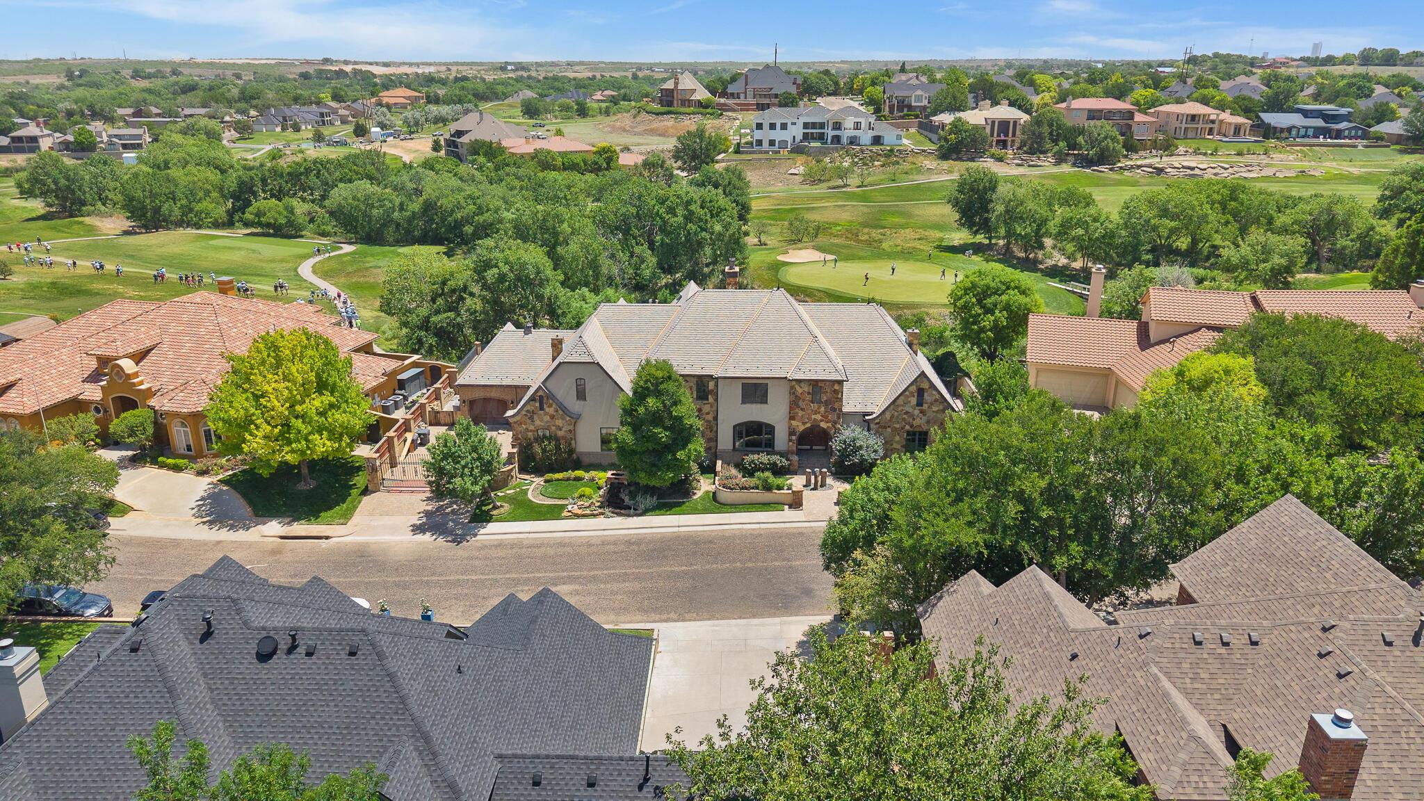 18 Cypress Point Amarillo, TX 79124 - Photo 93 of 95 an aerial view of a house with garden space and lake view
