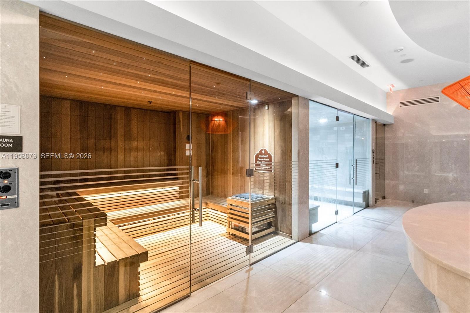 1010 Brickell Avenue, Unit 3207 Miami, FL 33131 - Photo 14 of 33 a view of a hallway with a outdoor space