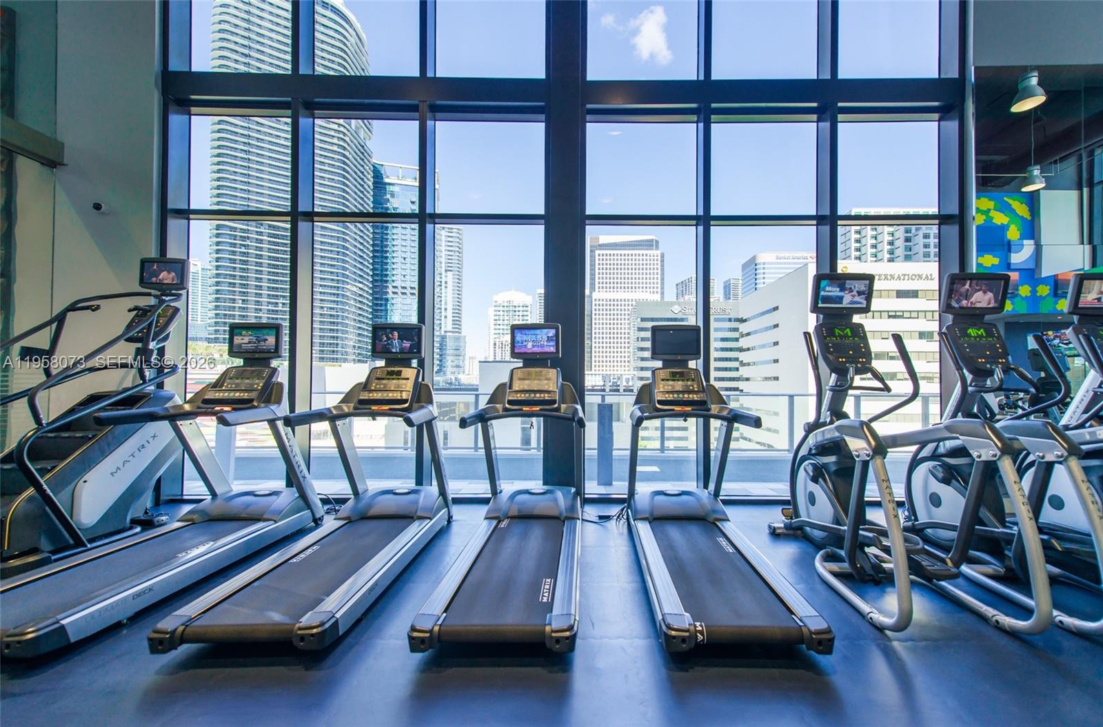 1010 Brickell Avenue, Unit 3207 Miami, FL 33131 - Photo 24 of 33 a view of a room with gym equipment