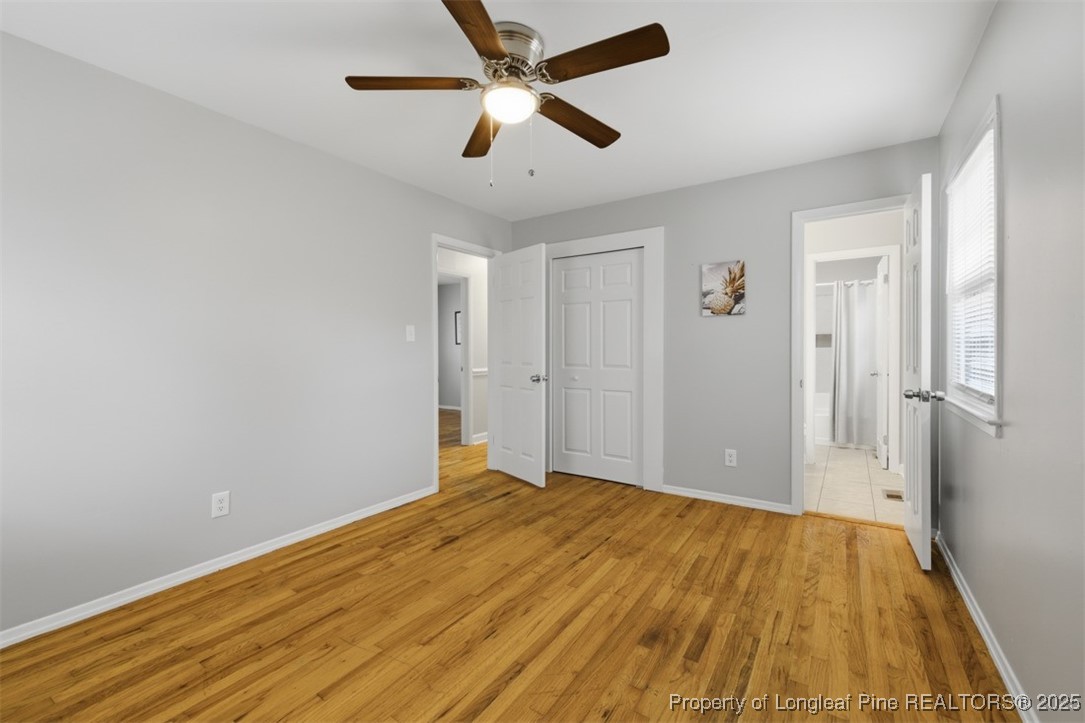 1109 Strickland Bridge Road Fayetteville, NC 28304 - Photo 11 of 20 a view of empty room with wooden floor