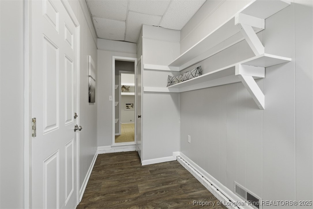 1109 Strickland Bridge Road Fayetteville, NC 28304 - Photo 15 of 20 a view of hallway with wooden floor