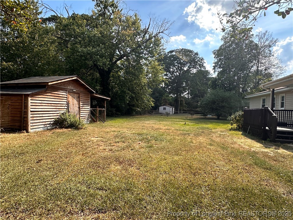 1109 Strickland Bridge Road Fayetteville, NC 28304 - Photo 19 of 20 a view of a house with a yard
