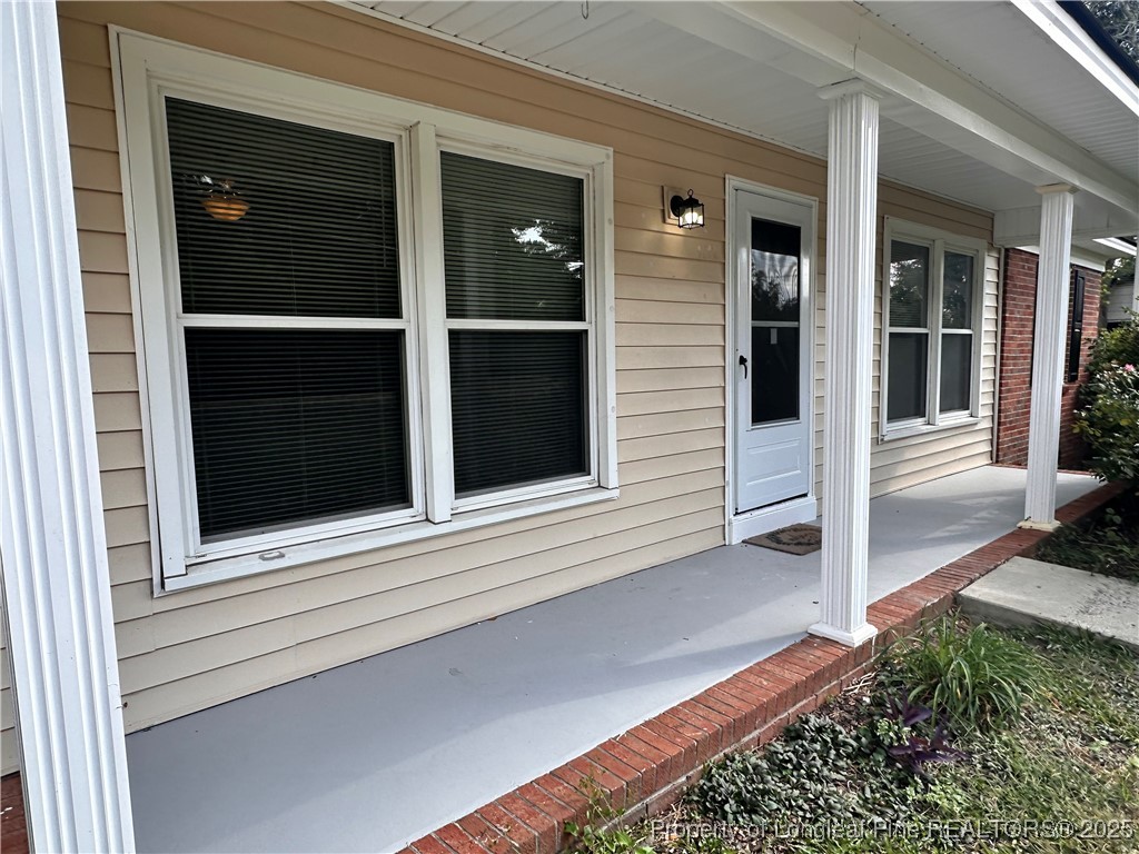 1109 Strickland Bridge Road Fayetteville, NC 28304 - Photo 20 of 20 front view of a house with a window