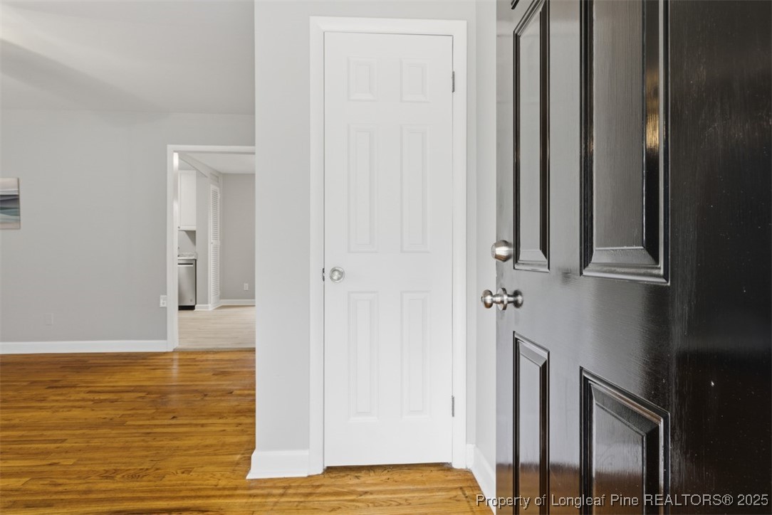 1109 Strickland Bridge Road Fayetteville, NC 28304 - Photo 2 of 20 a view of room with wooden floor