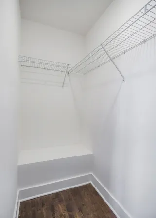 a view of an empty walk in closet
