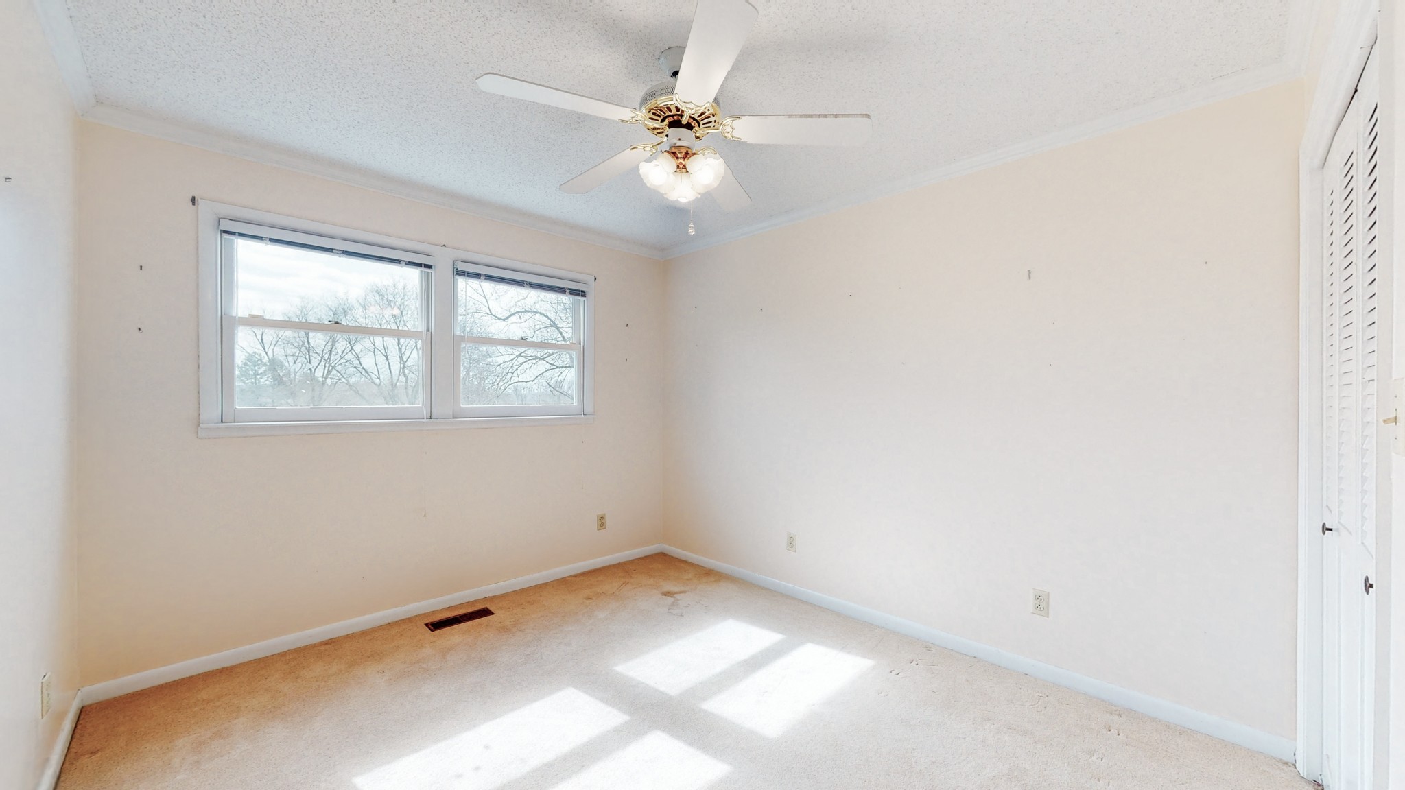 2165 Palmer Road Lebanon, TN 37090 - Photo 28 of 67 an empty room with a window and a fan