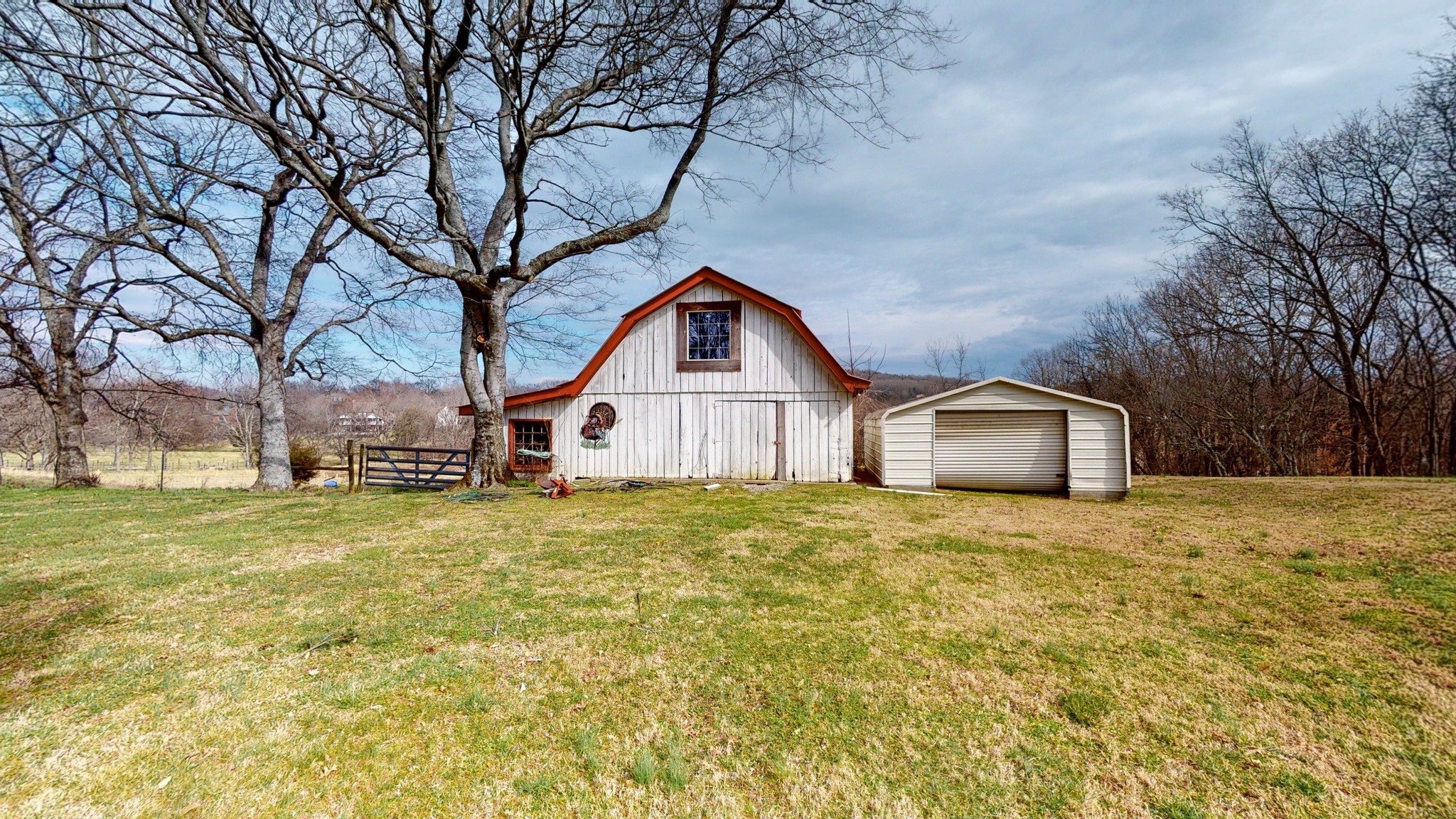 2165 Palmer Road Lebanon, TN 37090 - Photo 5 of 67 a front view of a house with a yard and garage
