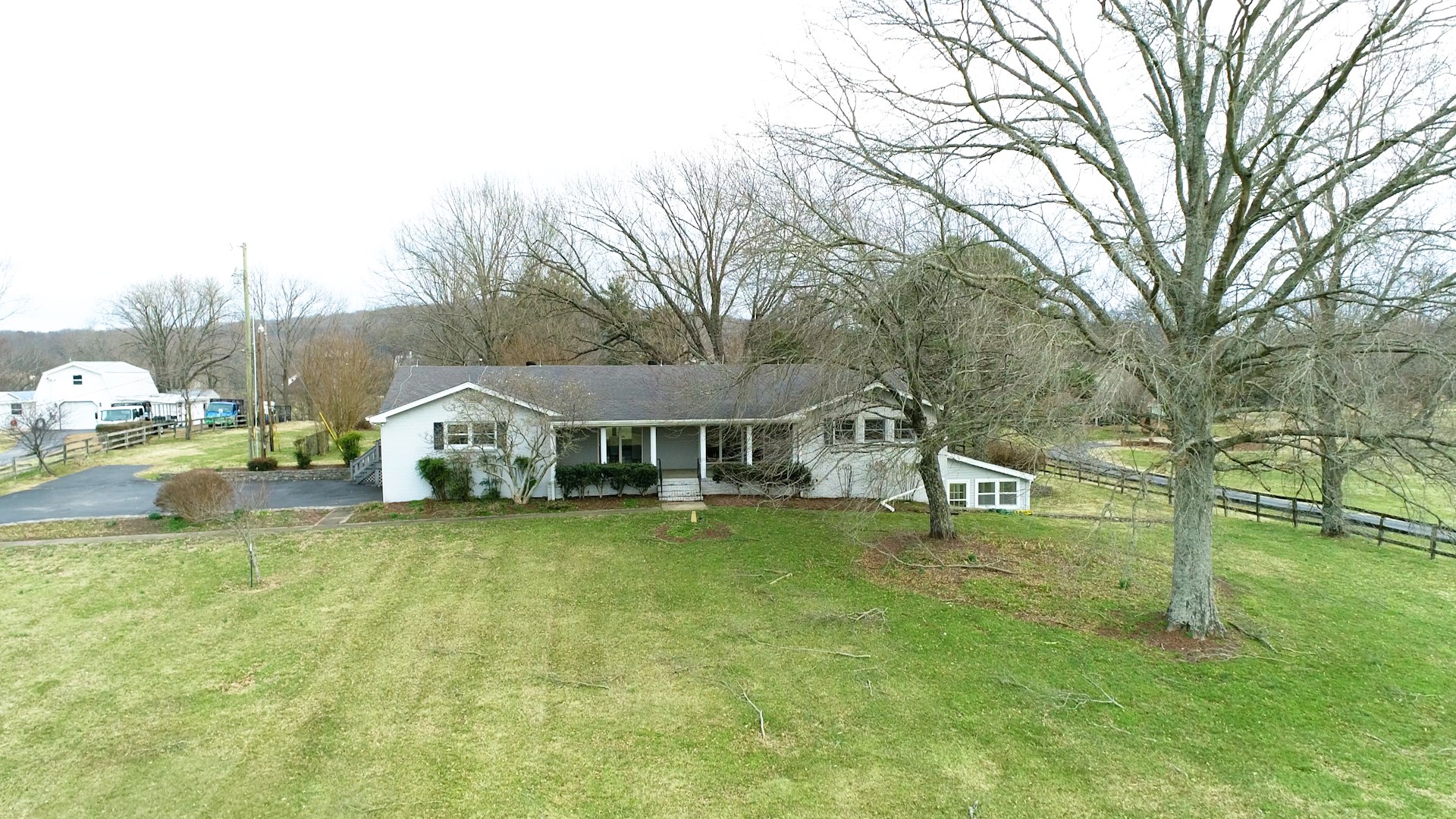 2165 Palmer Road Lebanon, TN 37090 - Photo 59 of 67 a view of a house with a big yard and large trees