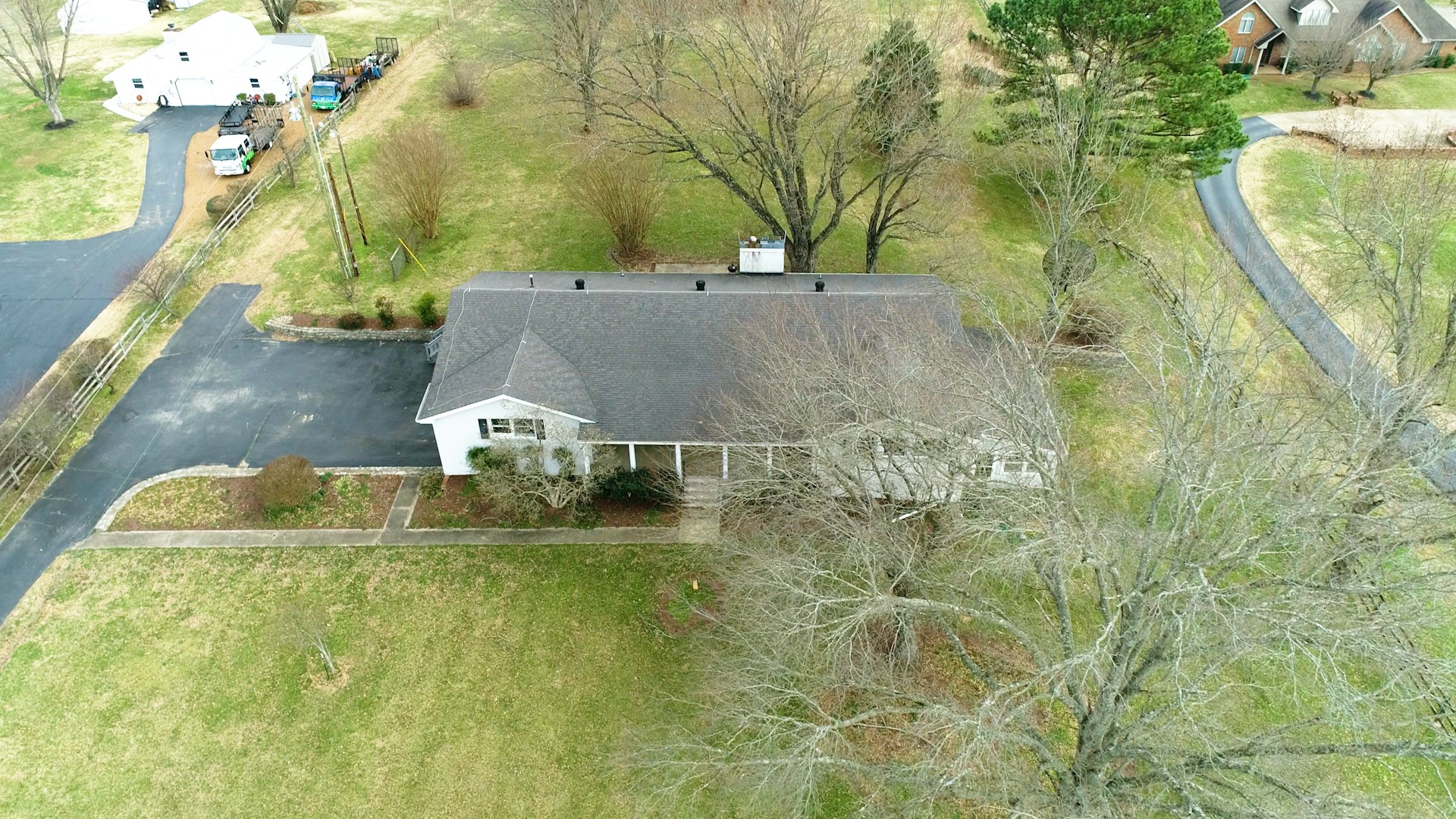 2165 Palmer Road Lebanon, TN 37090 - Photo 60 of 67 a swimming pool with trees in front of it
