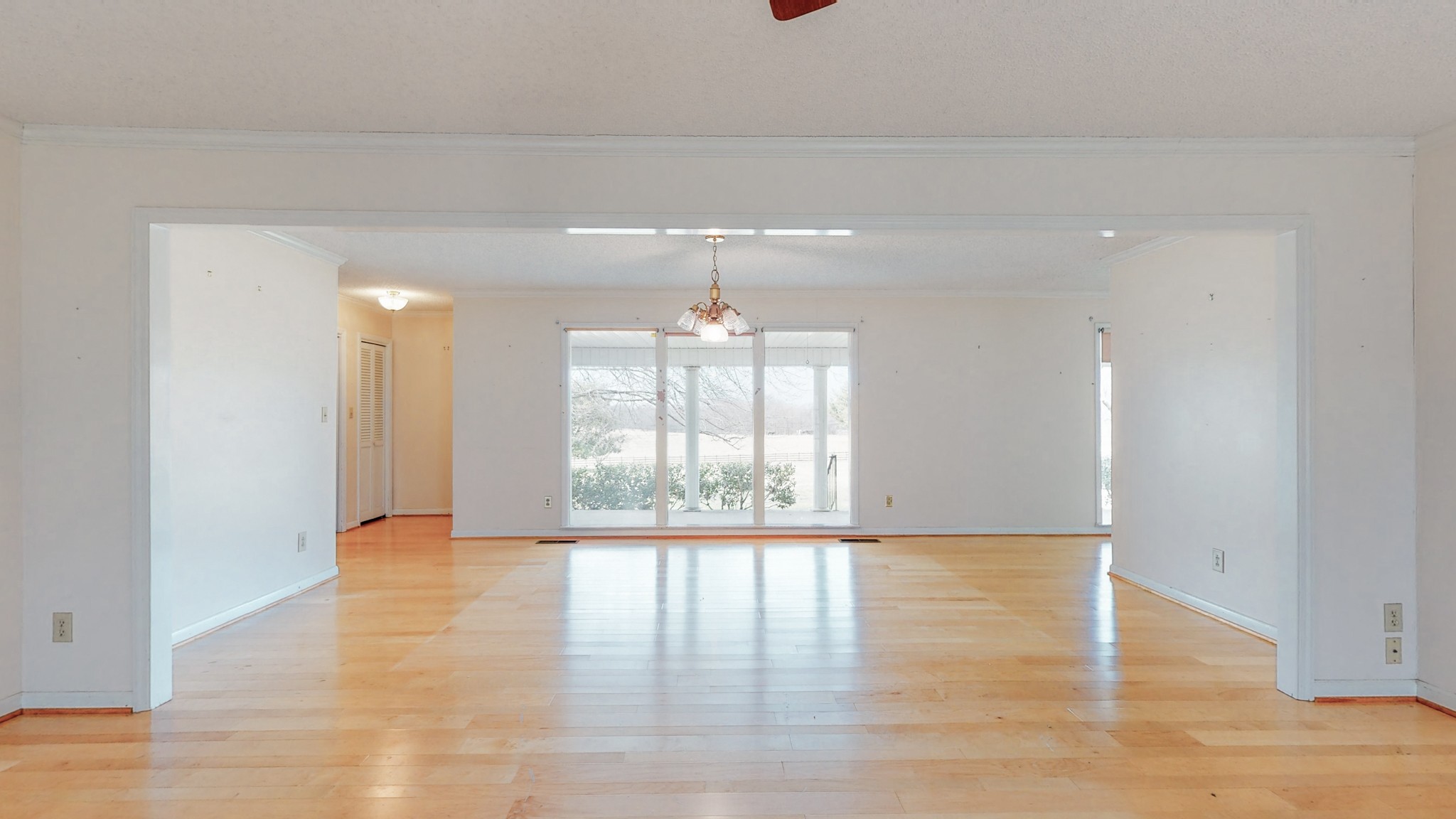 2165 Palmer Road Lebanon, TN 37090 - Photo 10 of 67 a view of an empty room with wooden floor and a window
