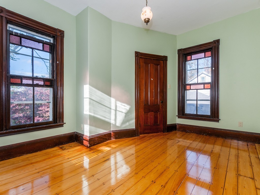9 Cornauba Street Boston, MA 02131 - Photo 12 of 21 a view of an empty room with a window
