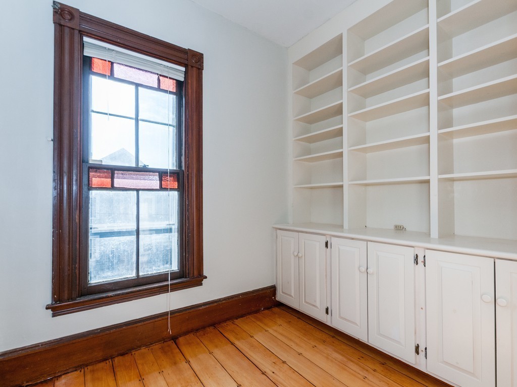 9 Cornauba Street Boston, MA 02131 - Photo 13 of 21 a view of an empty room with a window