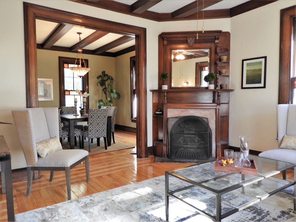 9 Cornauba Street Boston, MA 02131 - Photo 3 of 21 a living room with furniture and a fireplace