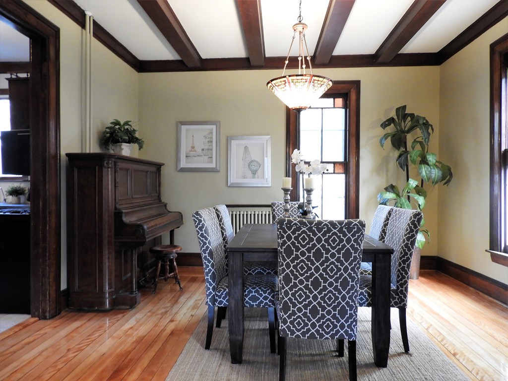9 Cornauba Street Boston, MA 02131 - Photo 6 of 21 a view of a dining room with furniture window and wooden floor