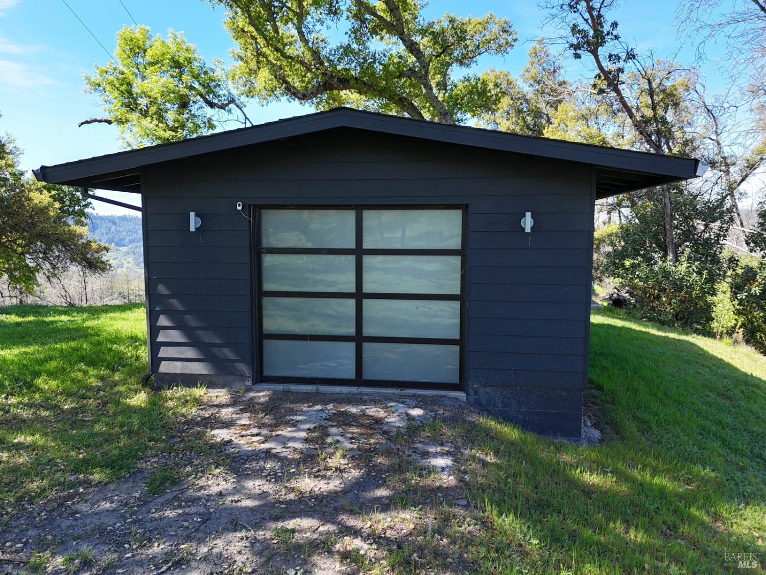 6505 Erland Road Santa Rosa, CA 95404 - Photo 14 of 41 a front view of a house with a garden