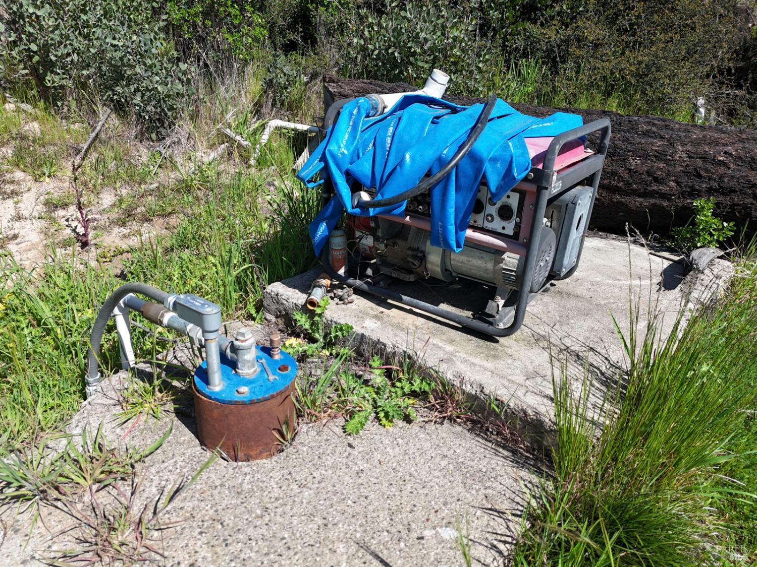 6505 Erland Road Santa Rosa, CA 95404 - Photo 34 of 41 a view of a small sitting in the back yard of a house