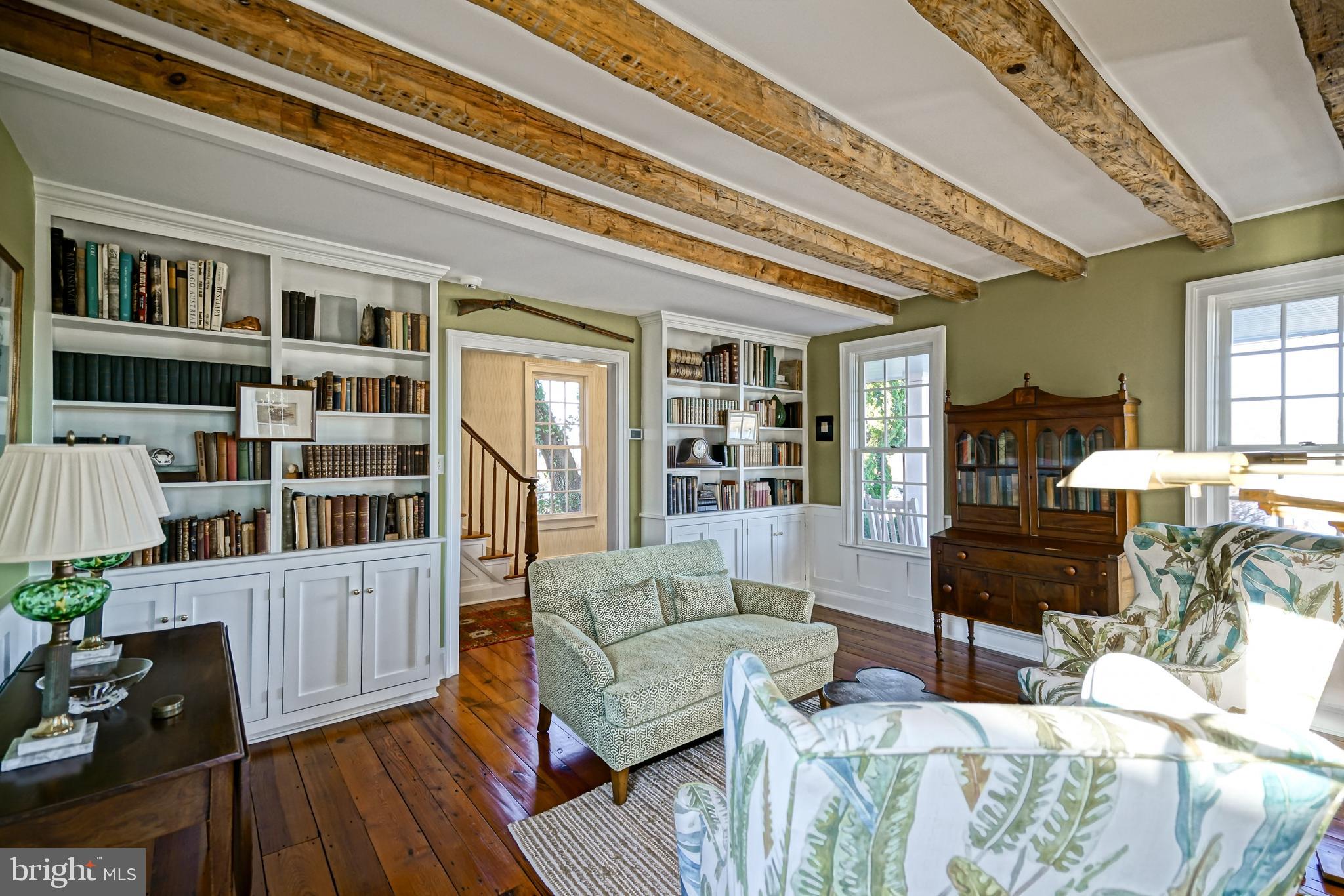 558 Pilottown Road Lewes, DE 19958 - Photo 16 of 142 a living room with furniture and wooden floor