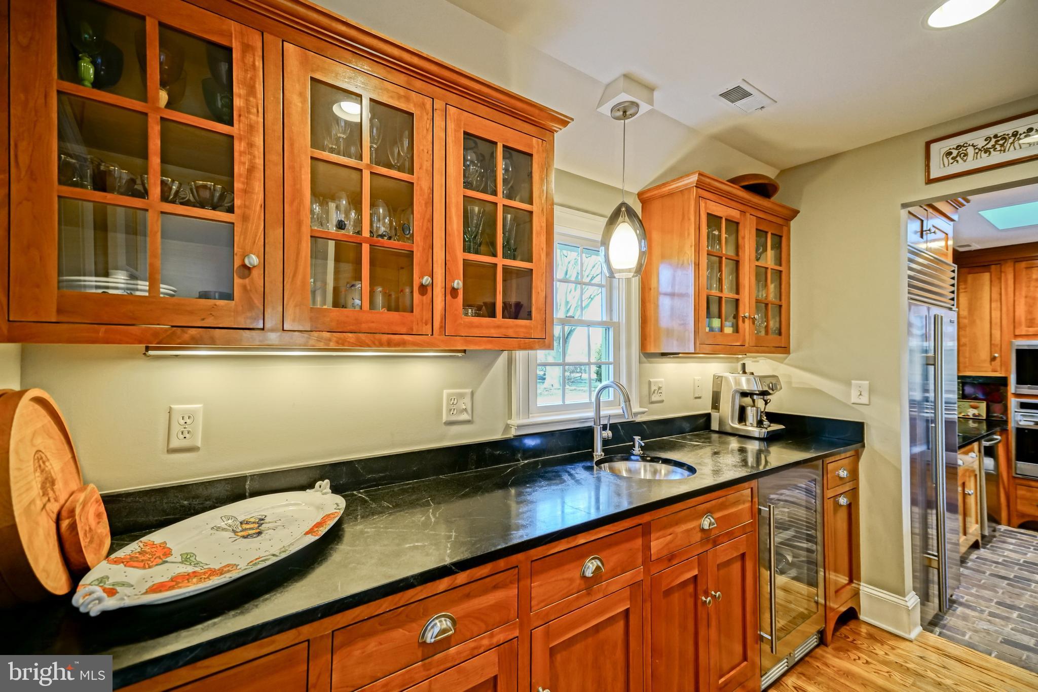 558 Pilottown Road Lewes, DE 19958 - Photo 39 of 142 a bathroom with a granite countertop sink a mirror and a bathtub