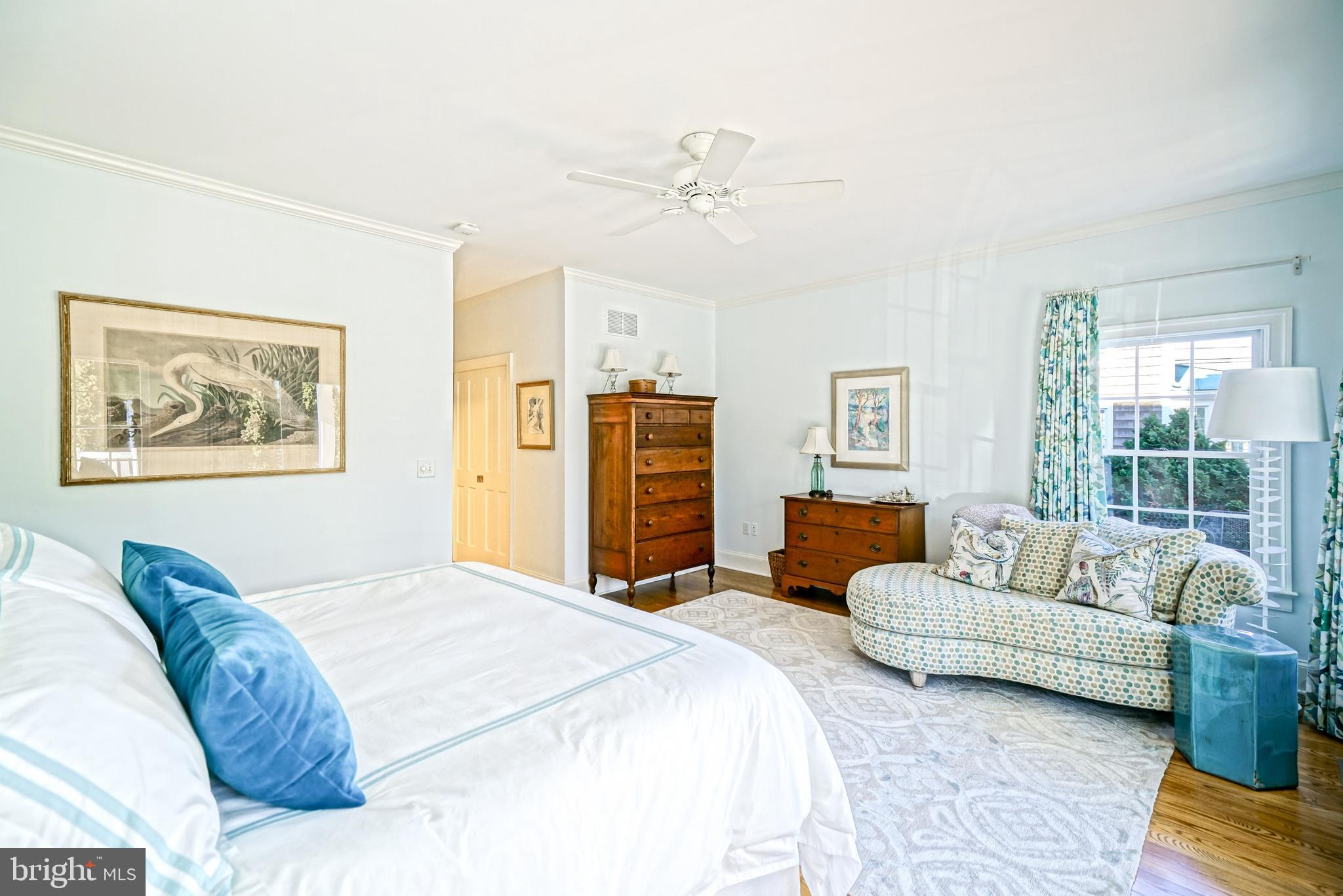 558 Pilottown Road Lewes, DE 19958 - Photo 52 of 142 a bedroom with a large bed couch and a window