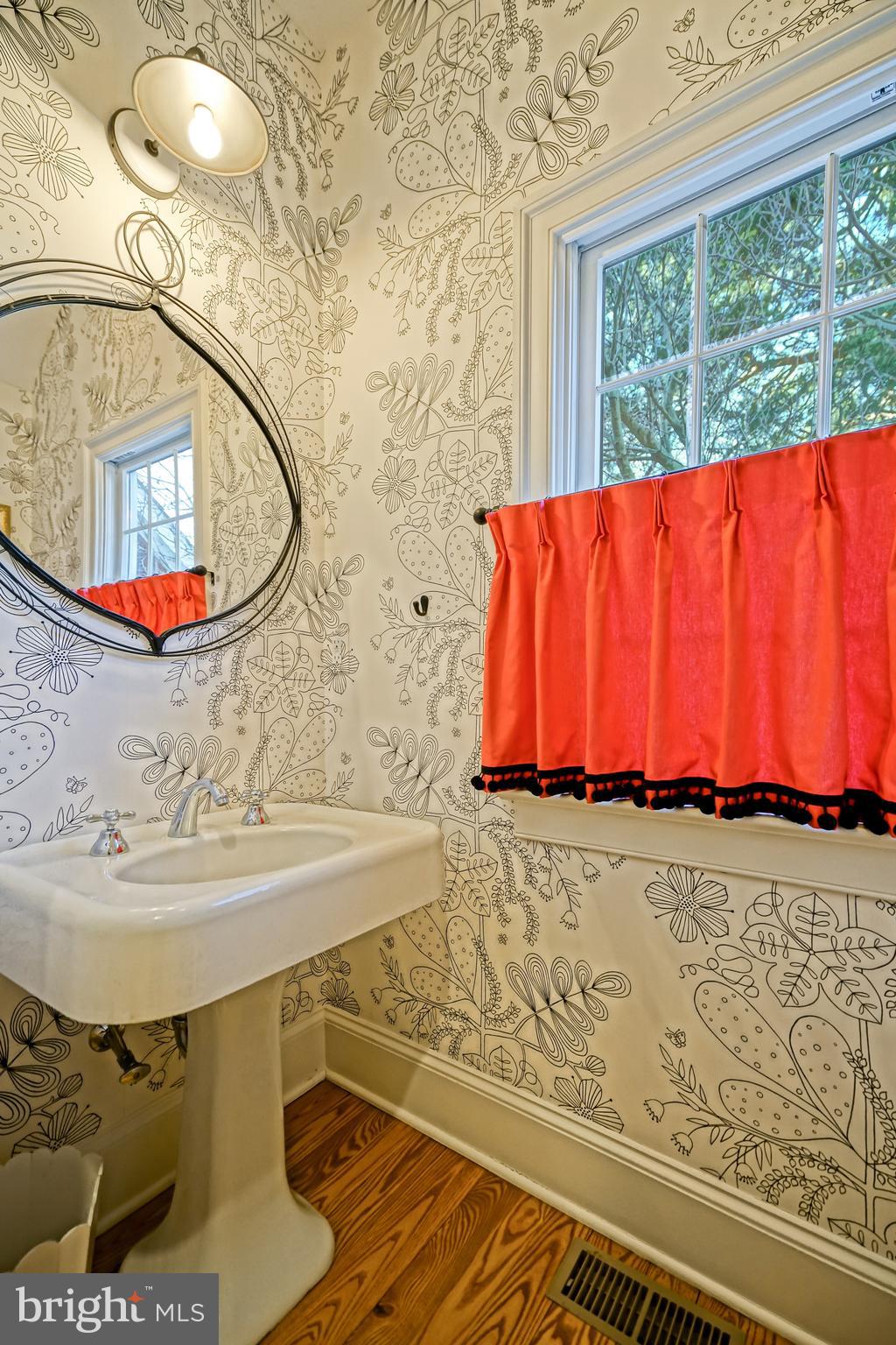 558 Pilottown Road Lewes, DE 19958 - Photo 57 of 142 a bathroom with a sink and mirror