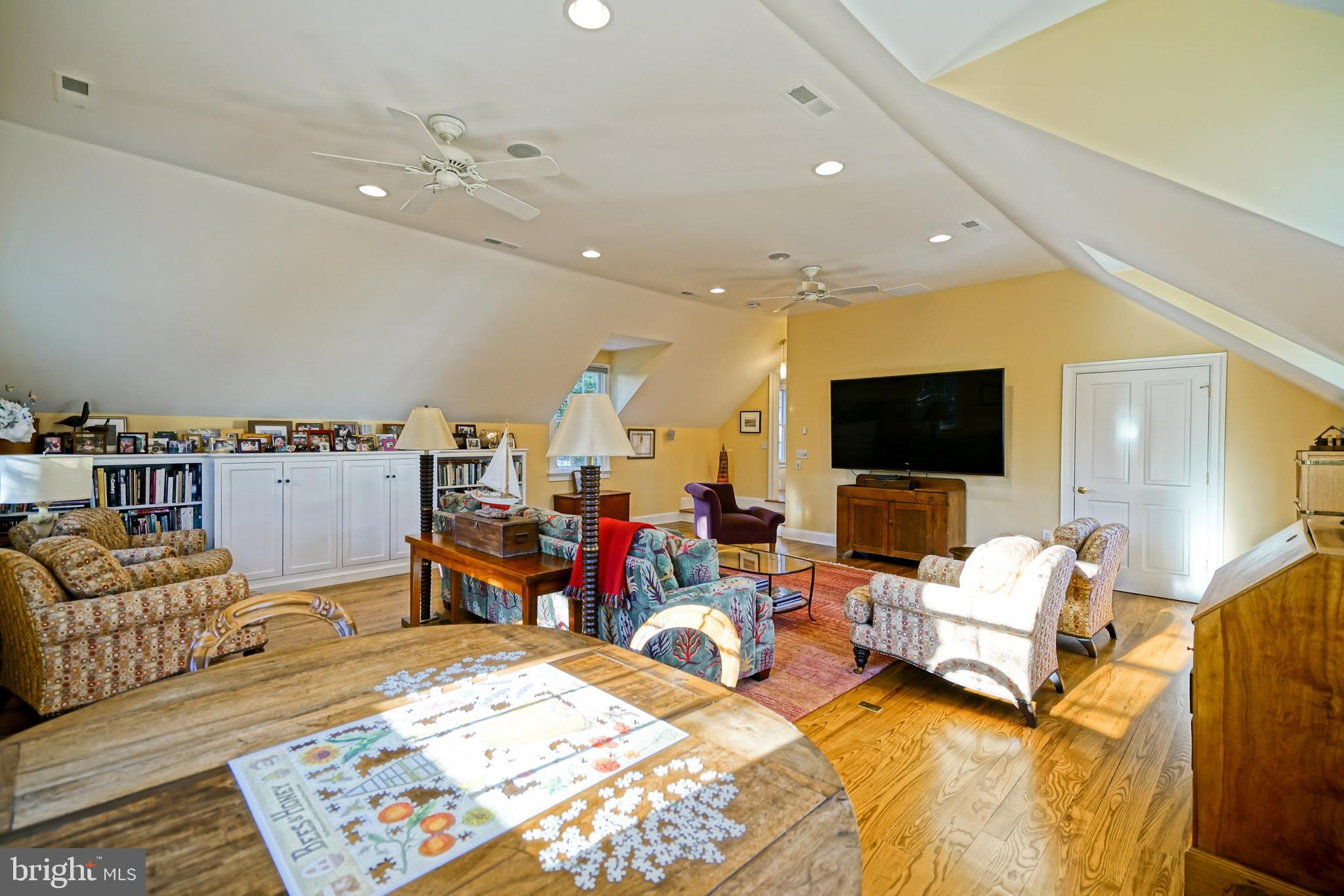 558 Pilottown Road Lewes, DE 19958 - Photo 65 of 142 a living room with furniture and a flat screen tv