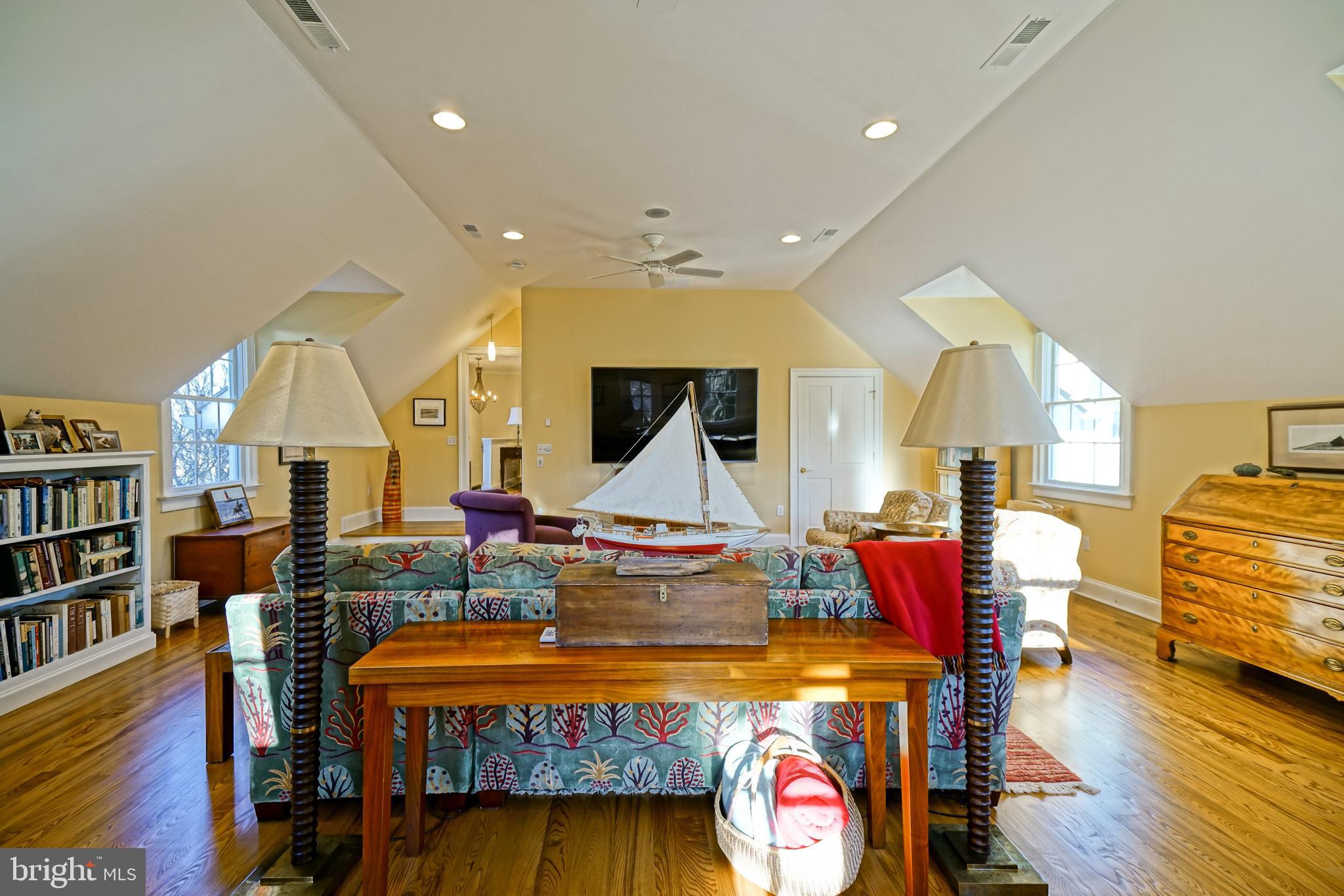 558 Pilottown Road Lewes, DE 19958 - Photo 73 of 142 a living room with fireplace furniture and a wooden floor