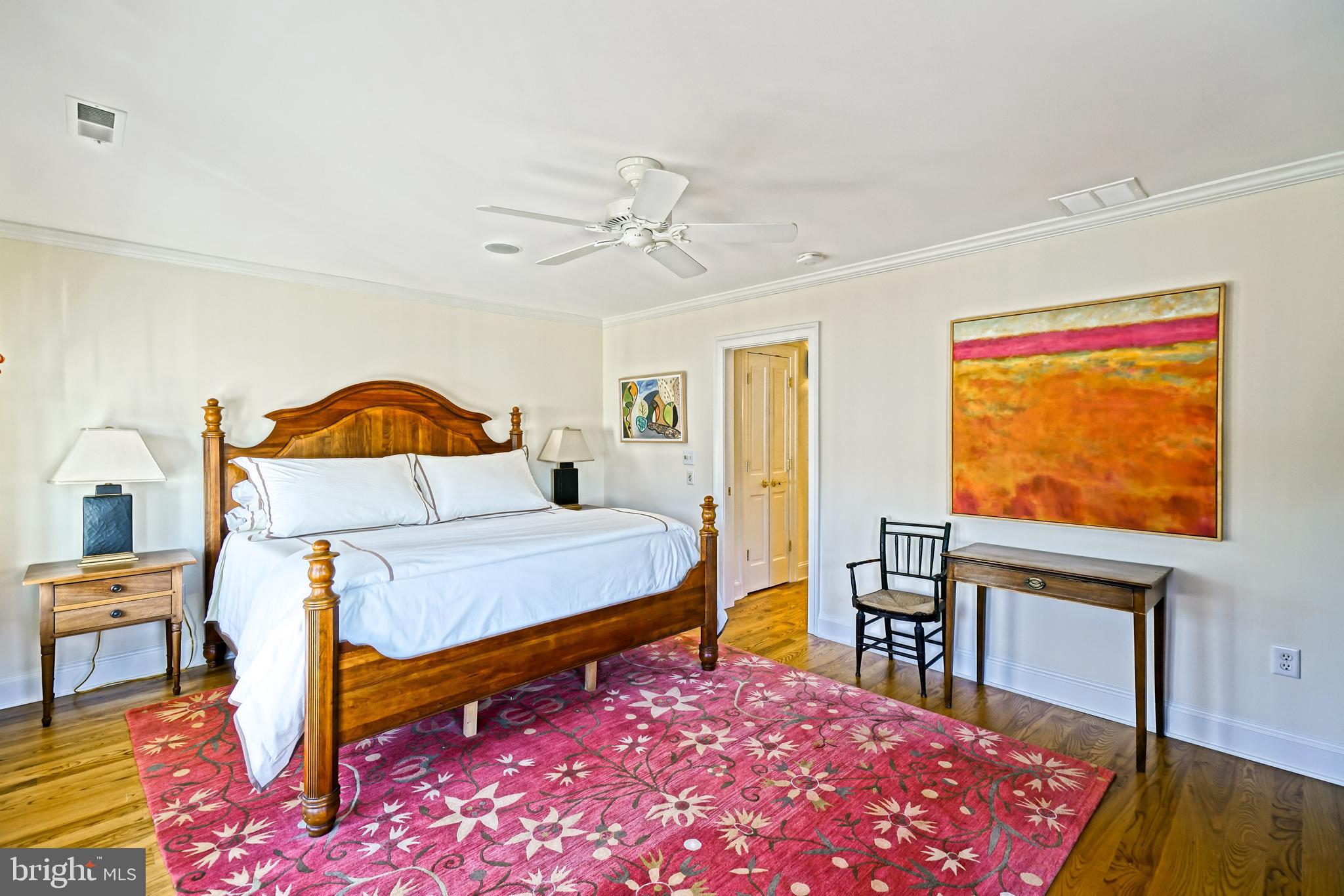 558 Pilottown Road Lewes, DE 19958 - Photo 78 of 142 a bedroom with a bed a dresser and chair