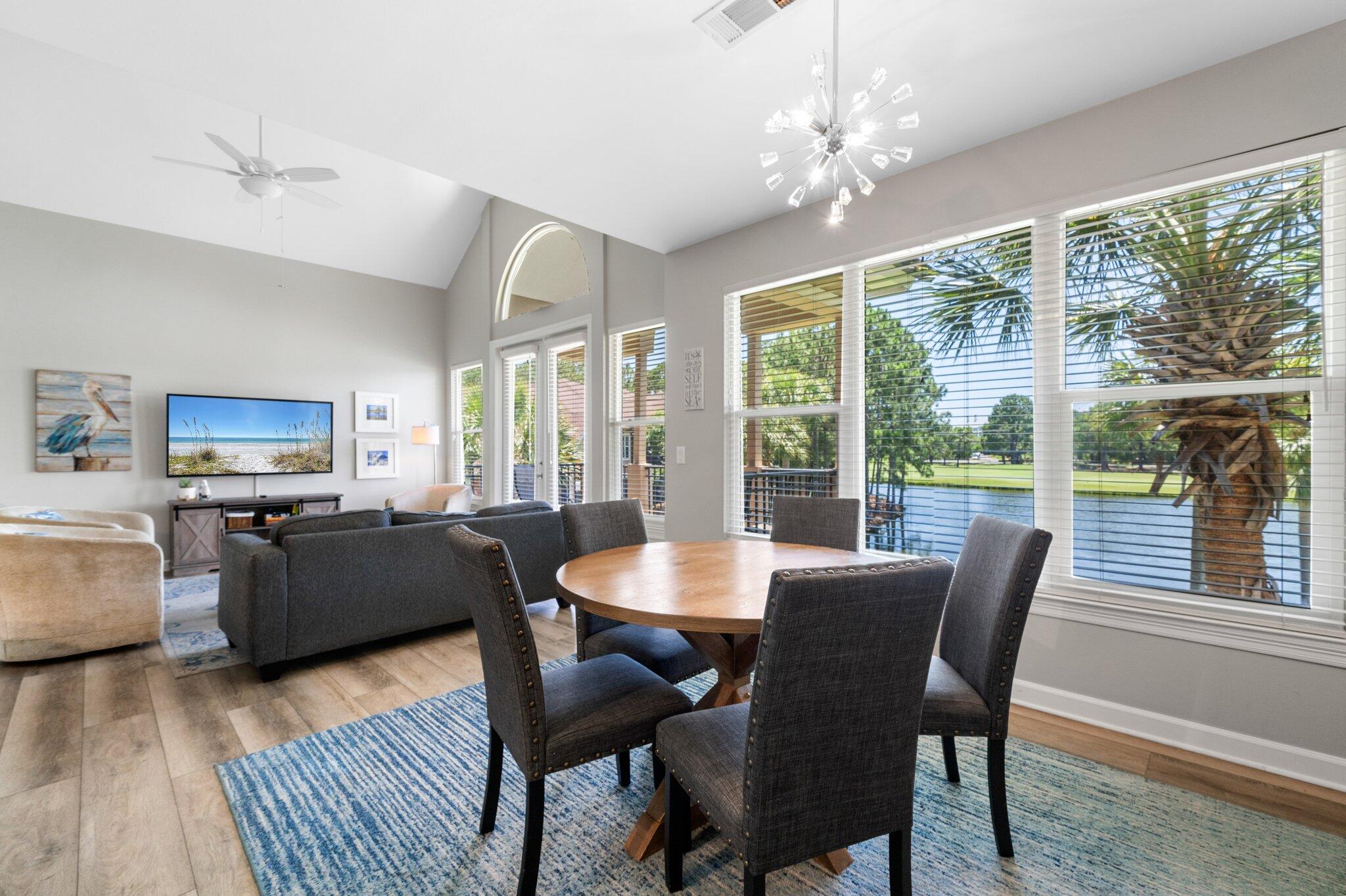 8512 Turnberry Court, Unit 8512 Miramar Beach, FL 32550 - Photo 11 of 35 a dining room with furniture window wooden floor