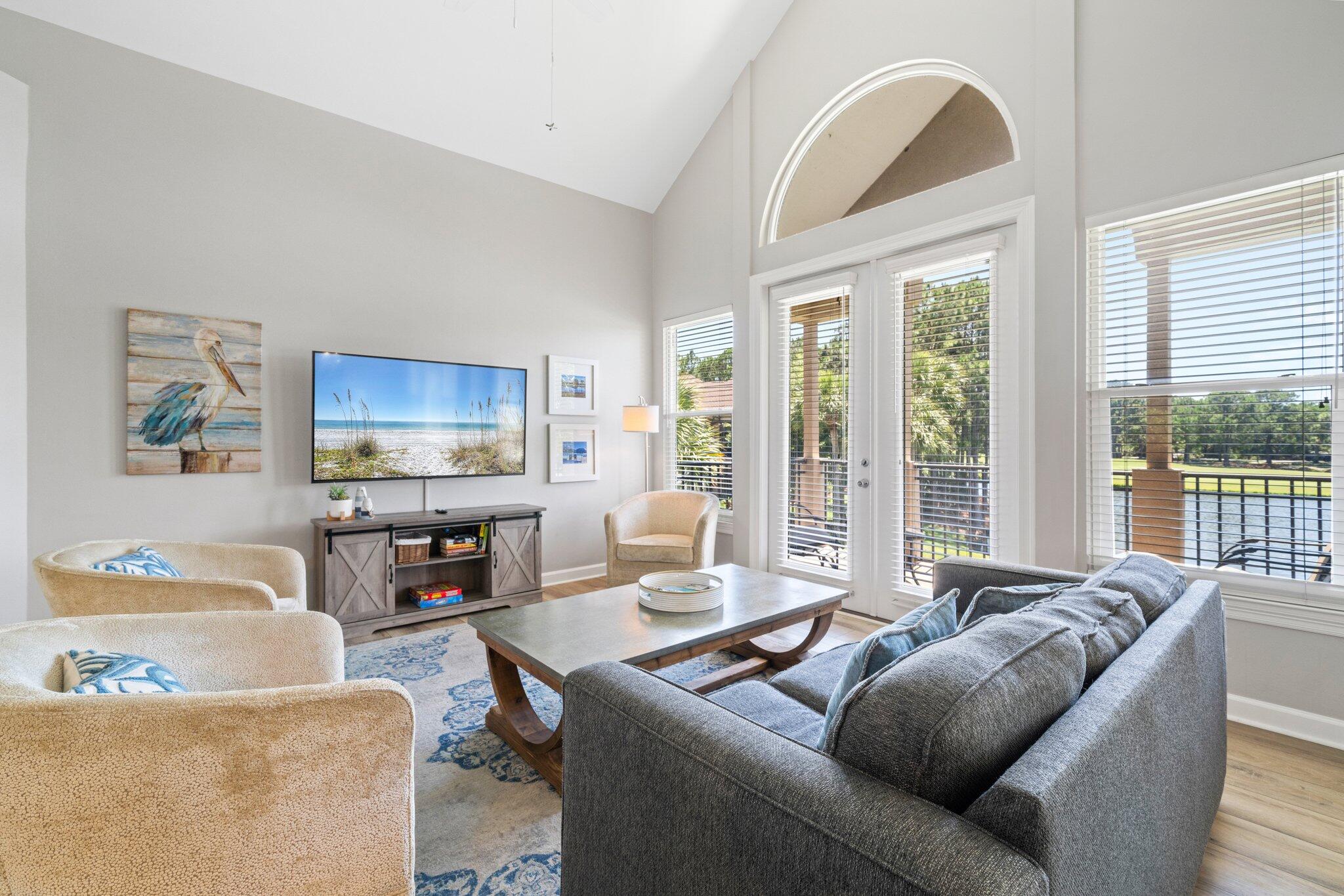 8512 Turnberry Court, Unit 8512 Miramar Beach, FL 32550 - Photo 14 of 35 a living room with furniture and a flat screen tv