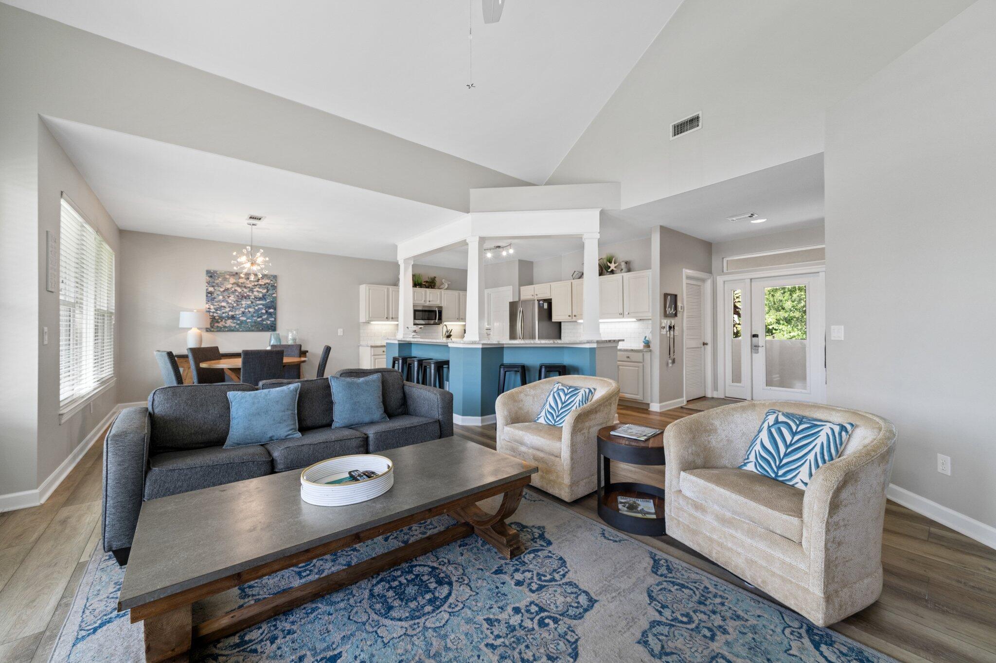 8512 Turnberry Court, Unit 8512 Miramar Beach, FL 32550 - Photo 17 of 35 a living room with furniture and a table